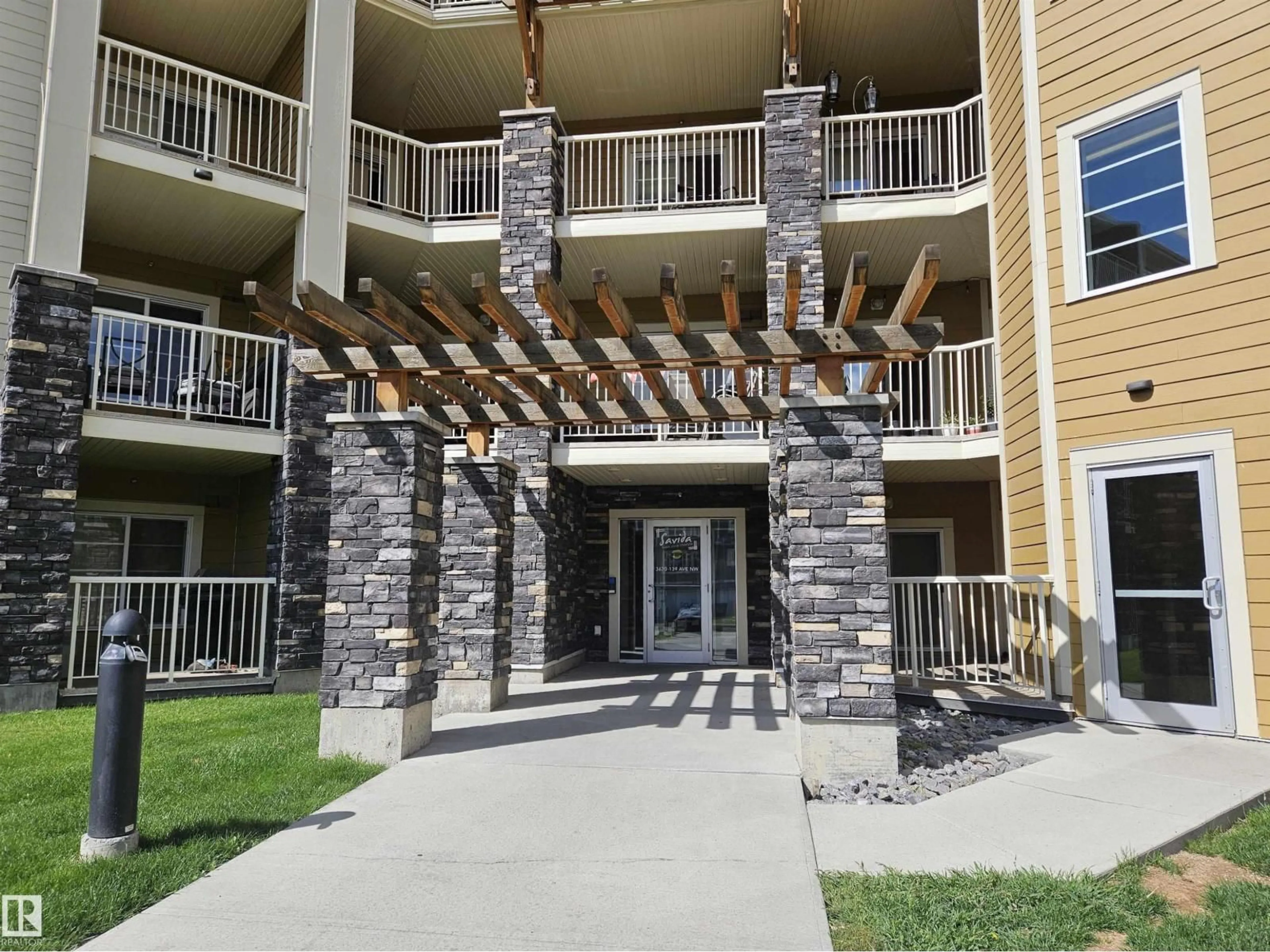 Patio, building for #205 - 3670 139 AV, Edmonton Alberta T5Y3N5