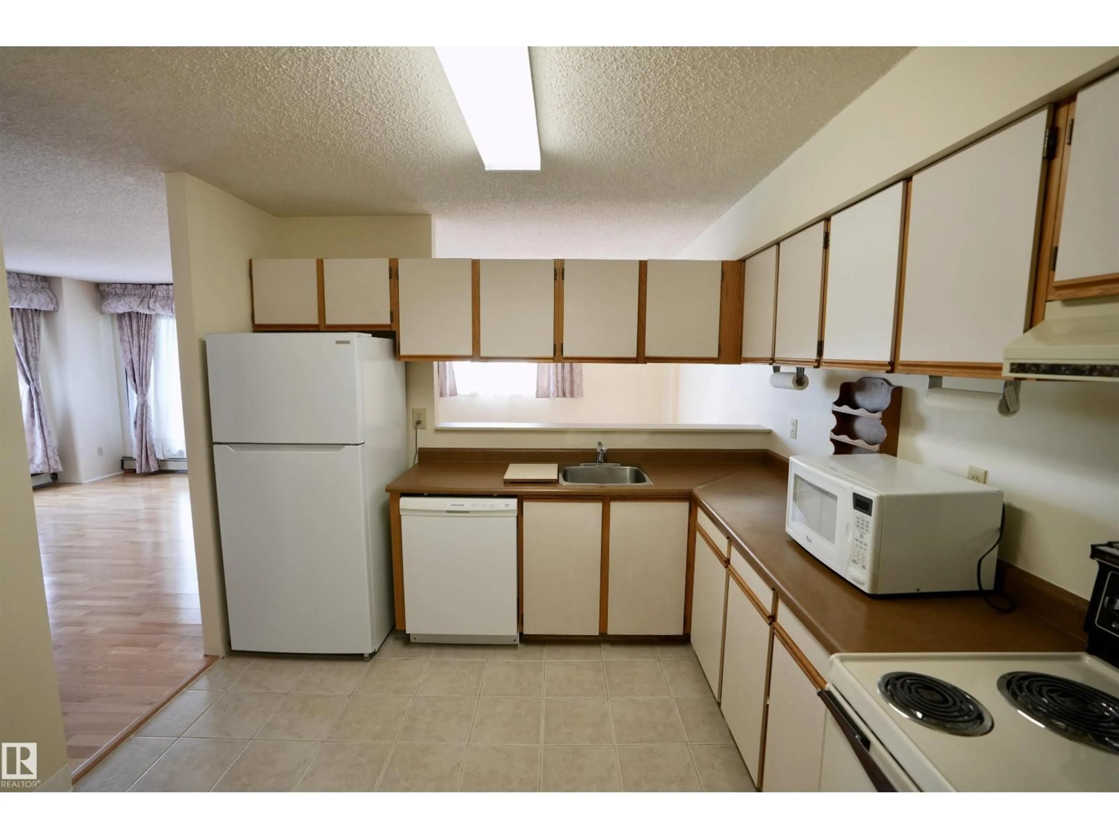 Standard kitchen, unknown for #503 - 10545 SASKATCHEWAN DR, Edmonton Alberta T6E6C6
