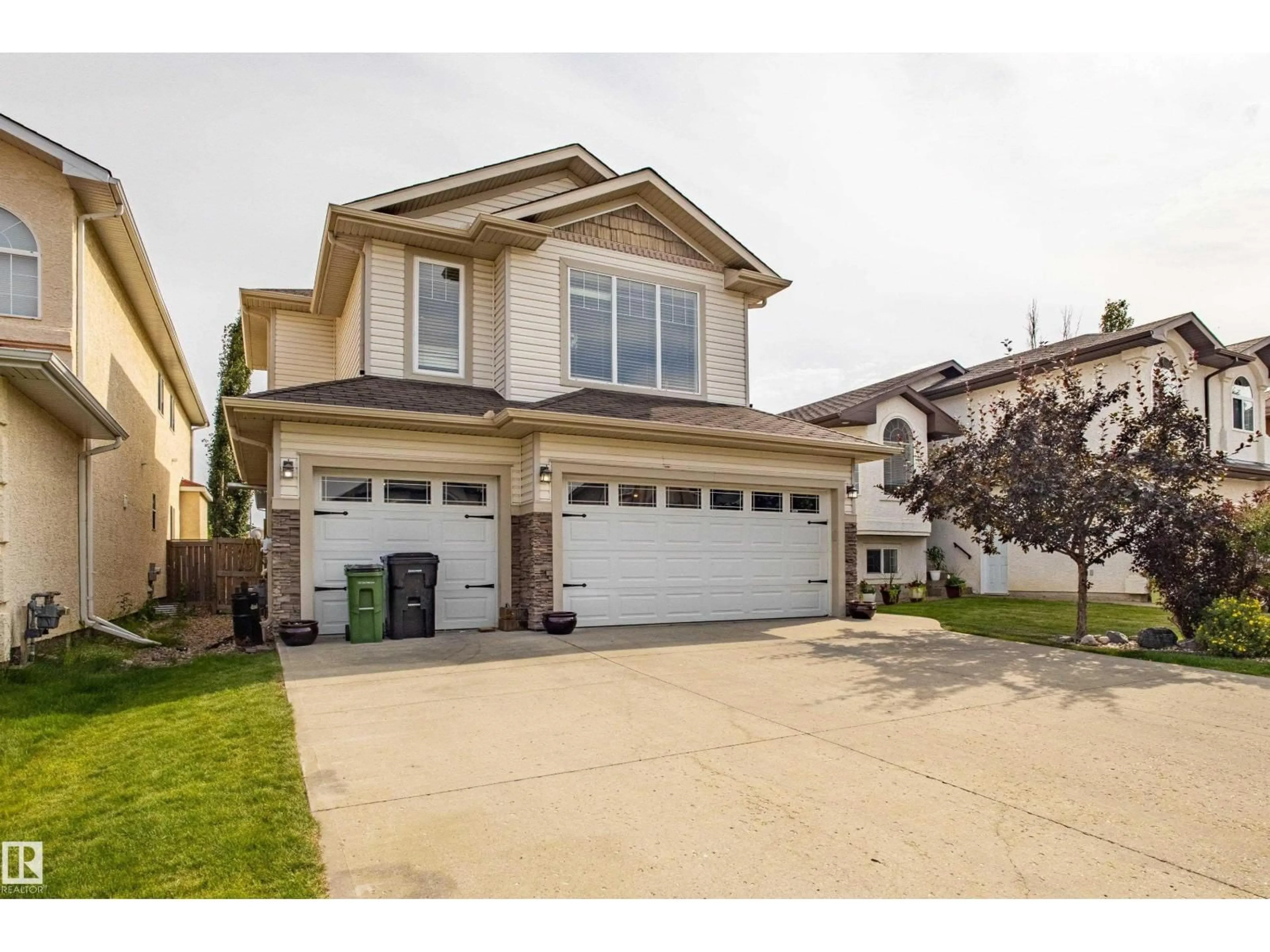 Home with vinyl exterior material, street for NW - 13511 162 AV, Edmonton Alberta T6V0C1