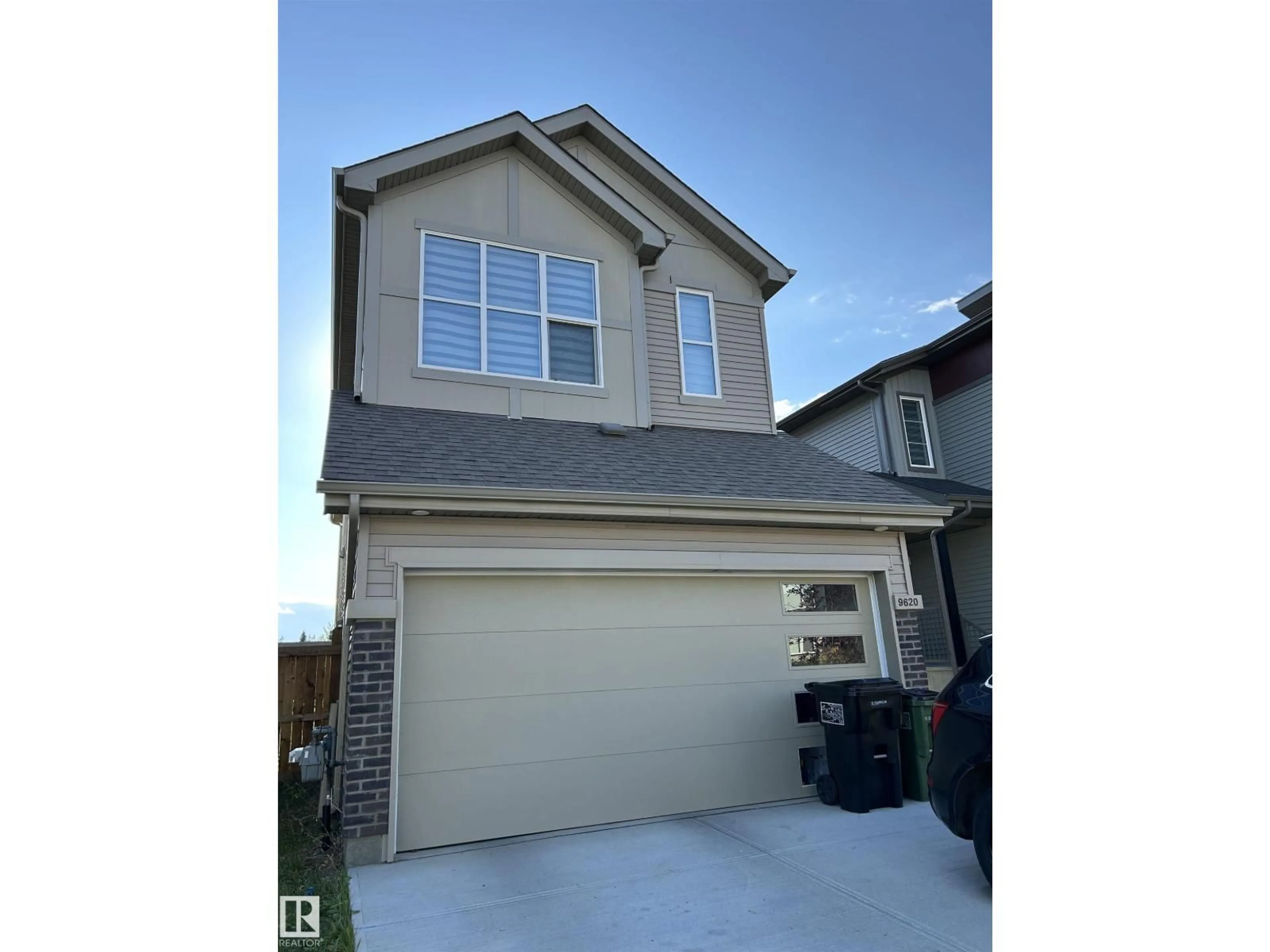 Home with vinyl exterior material, street for NW - 9620 230 ST, Edmonton Alberta T5T7R3