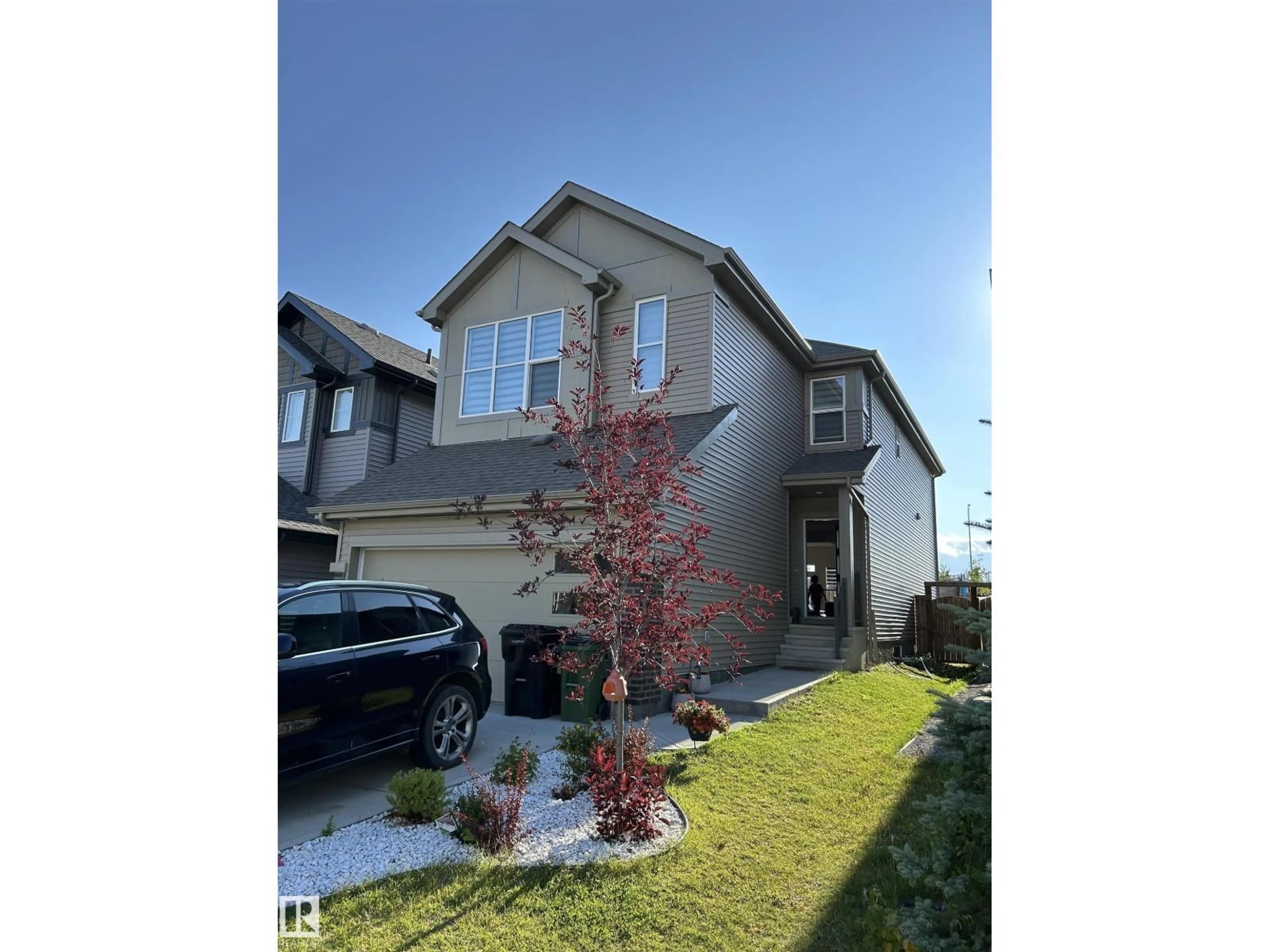 Home with vinyl exterior material, street for NW - 9620 230 ST, Edmonton Alberta T5T7R3