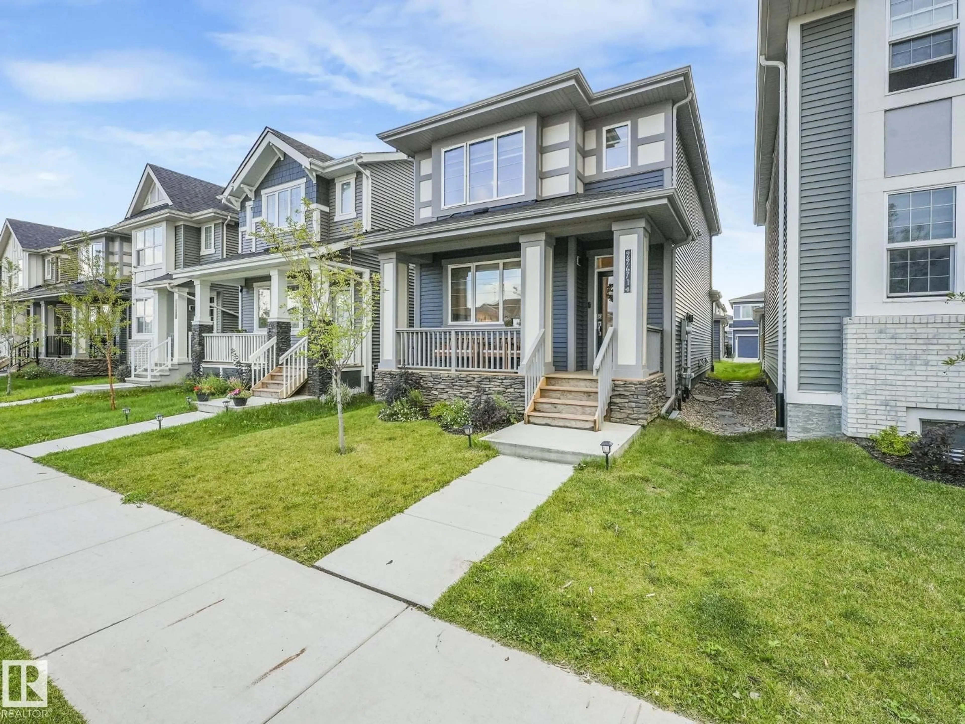 Home with vinyl exterior material, street for 22671 81 AV, Edmonton Alberta T5T7S8