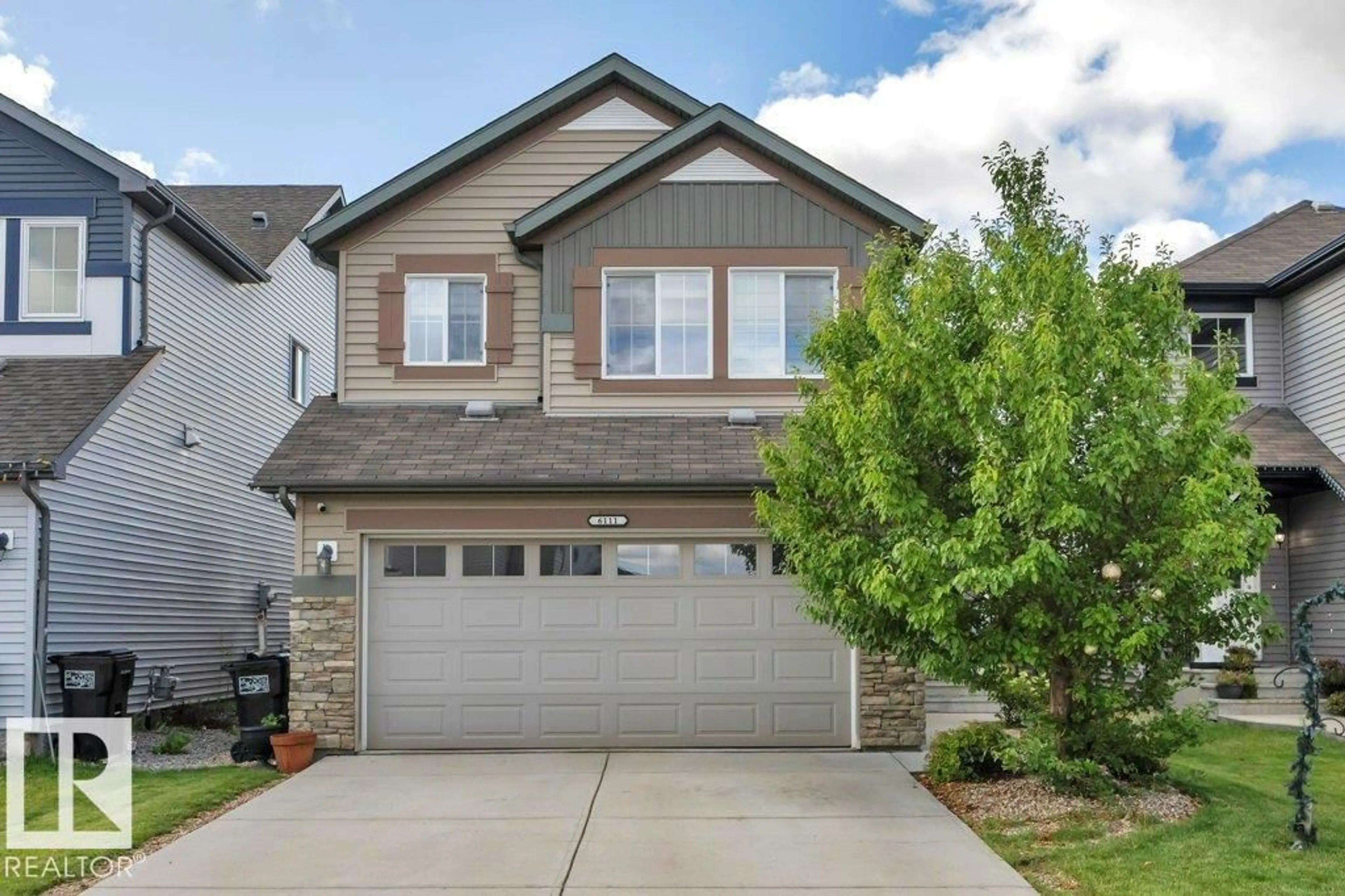 Home with vinyl exterior material, street for 6111 18 AV, Edmonton Alberta T6X0W3