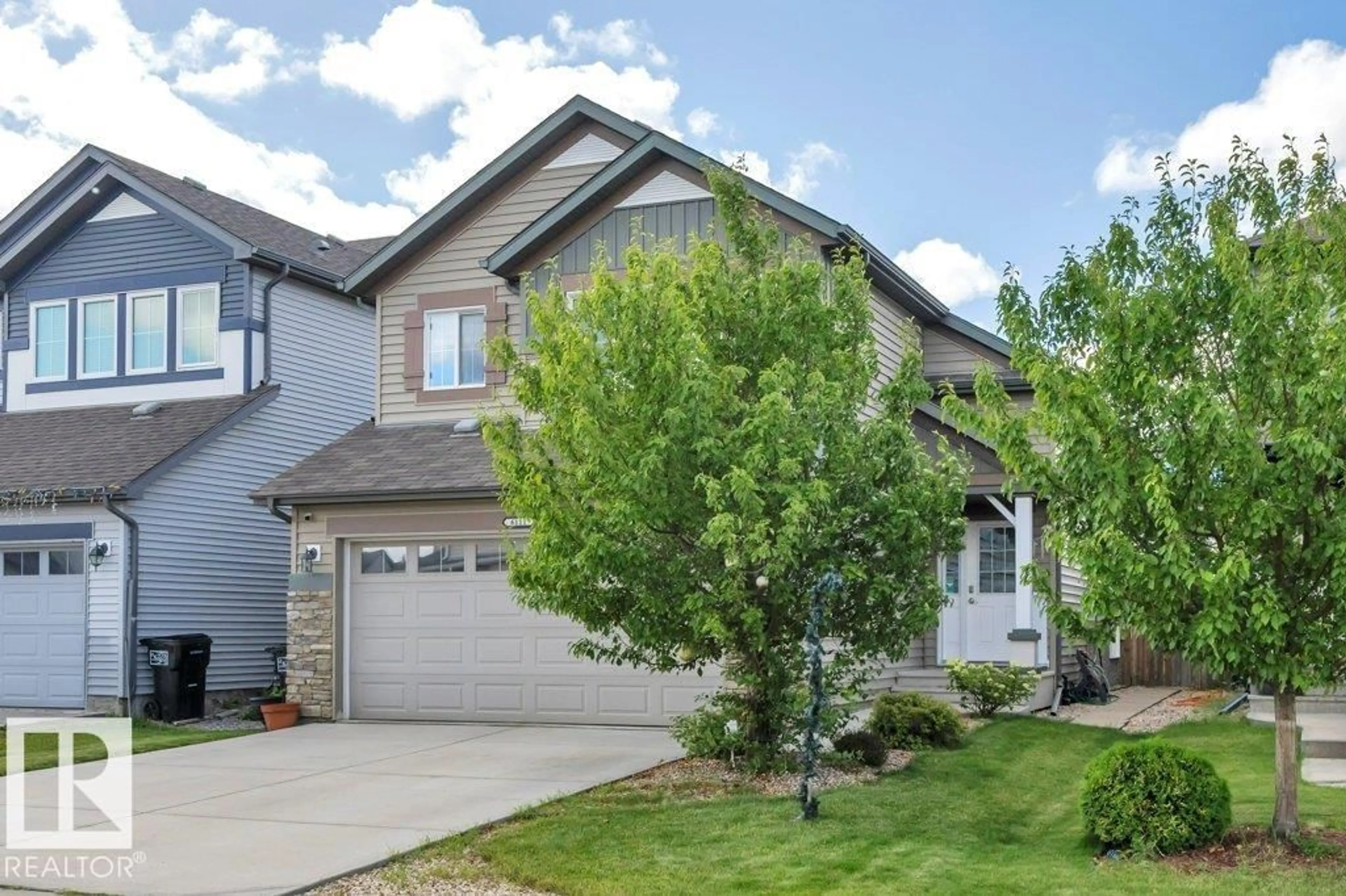 Home with vinyl exterior material, street for 6111 18 AV, Edmonton Alberta T6X0W3