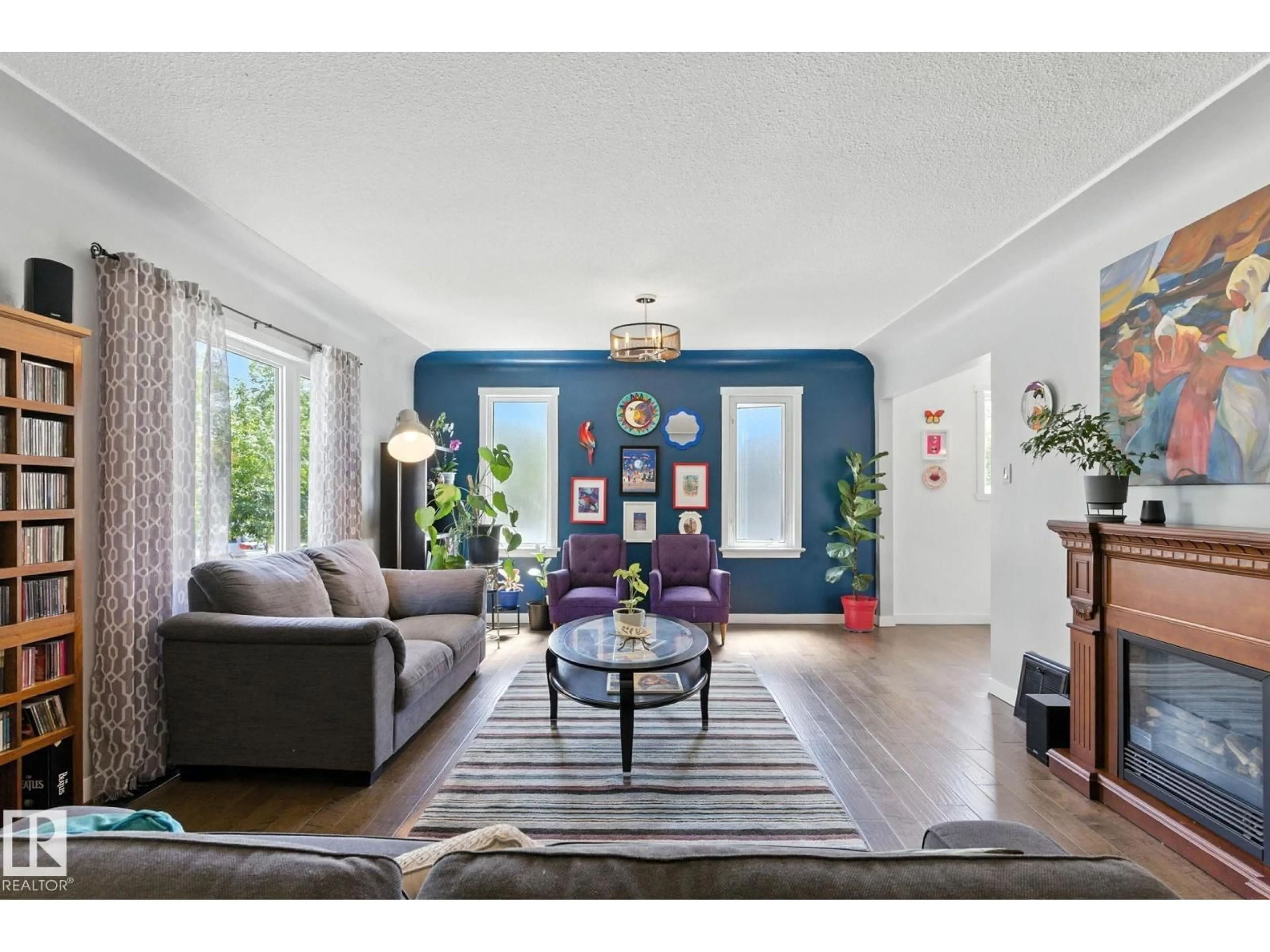 Living room with furniture, unknown for NW - 11204 61 ST, Edmonton Alberta T5W4A5