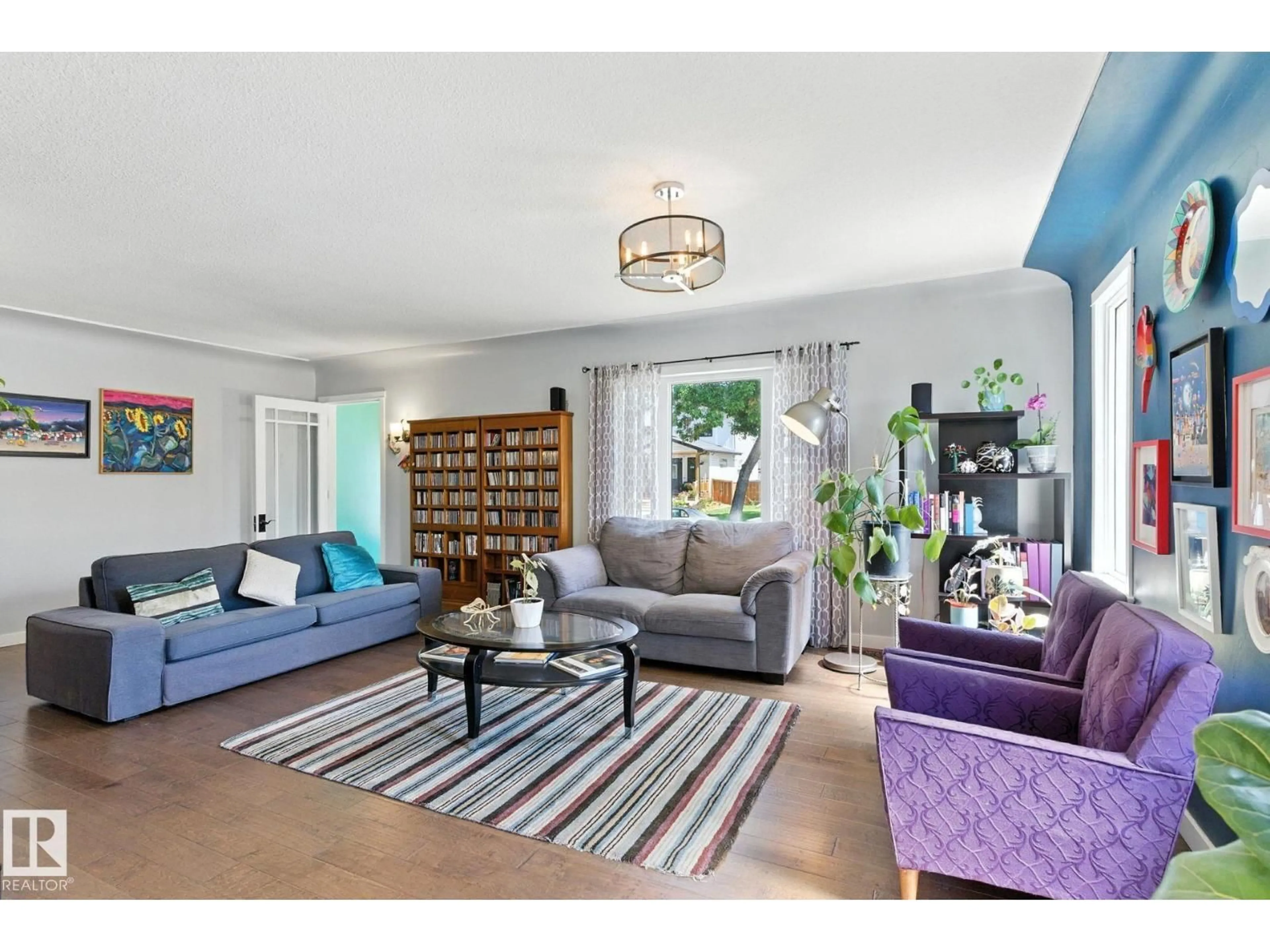Living room with furniture, unknown for NW - 11204 61 ST, Edmonton Alberta T5W4A5