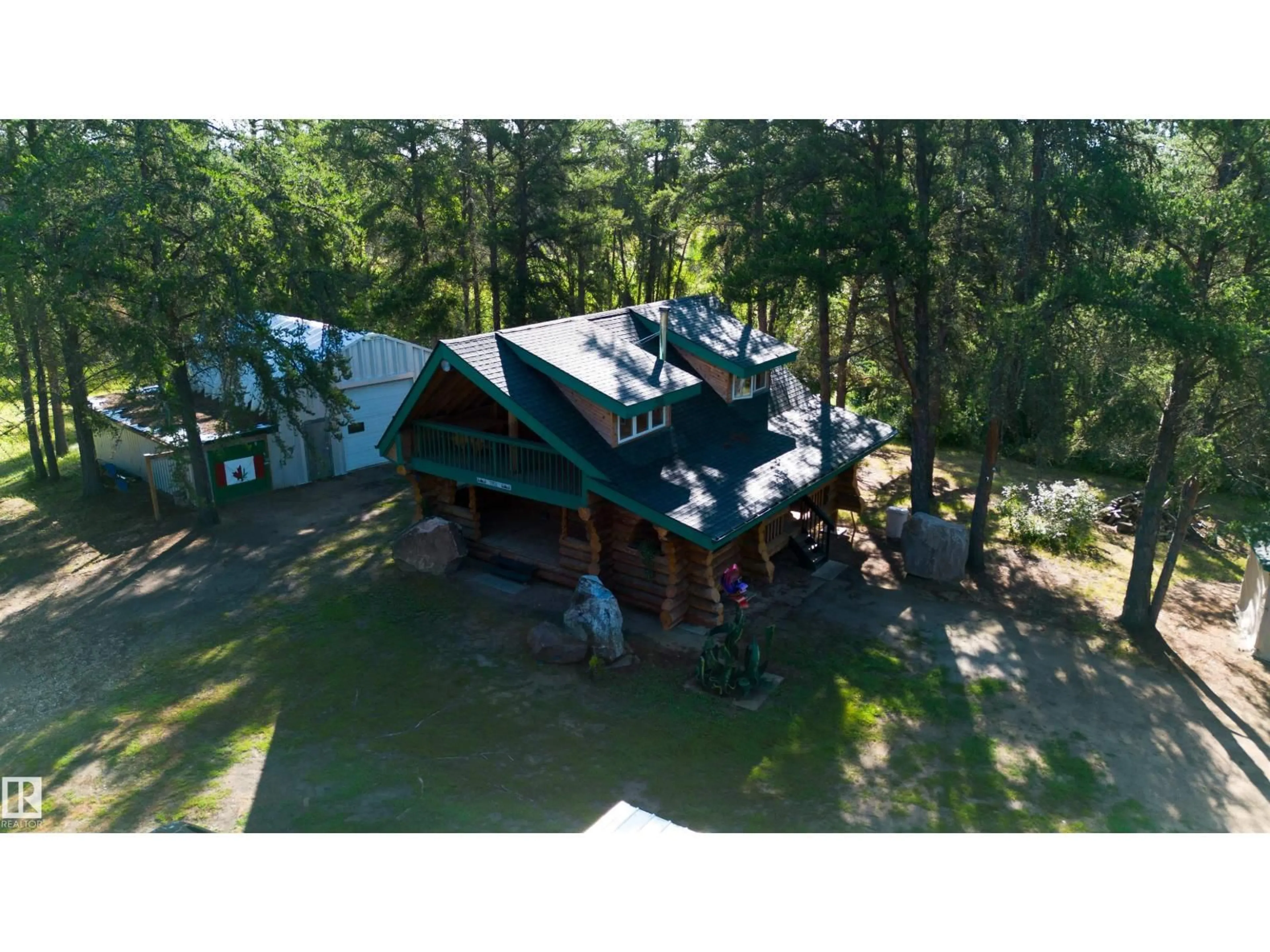 A pic from outside/outdoor area/front of a property/back of a property/a pic from drone, unknown for #2 - 60431 HWY 2, Rural Westlock County Alberta T0G1S0