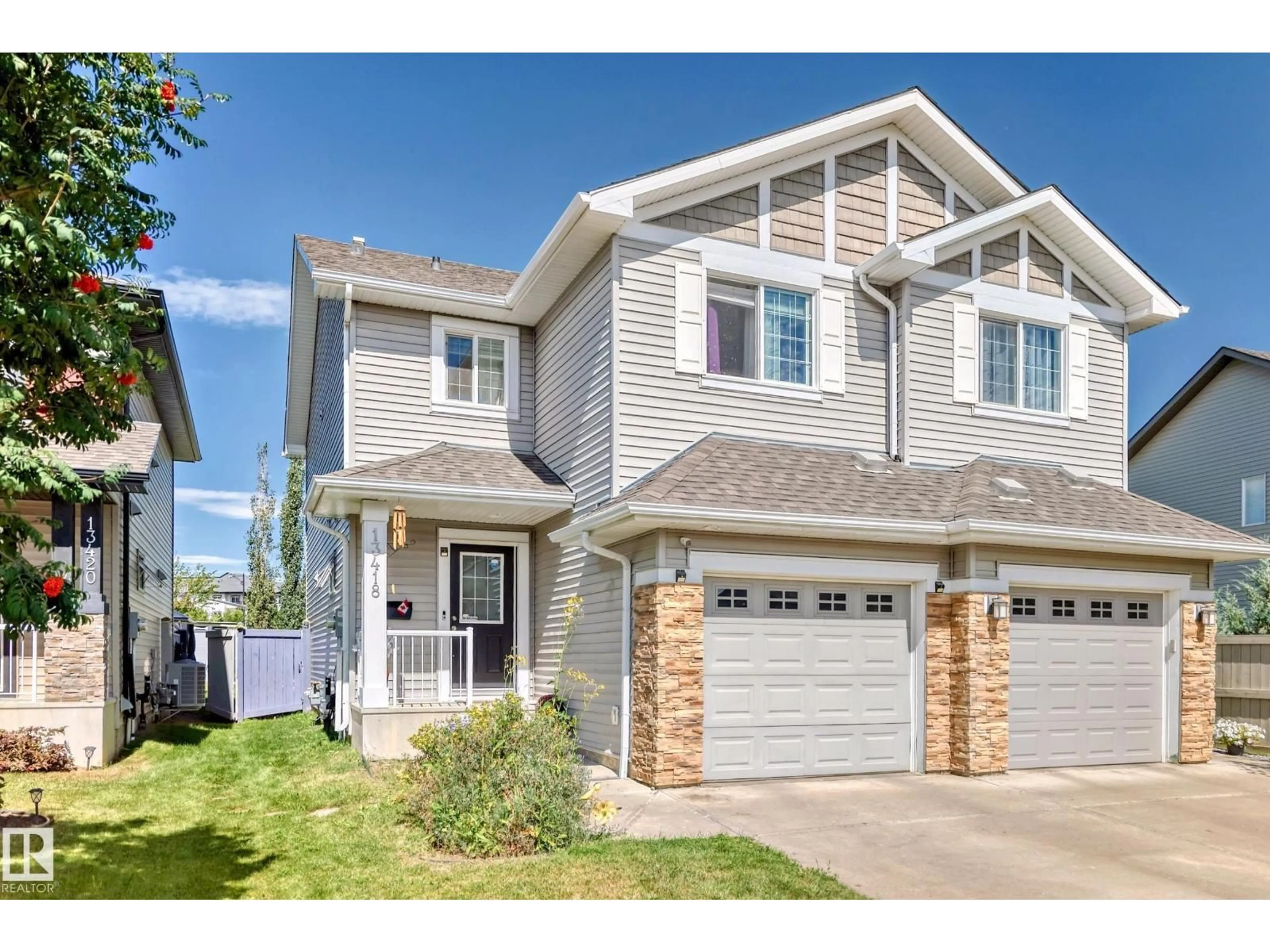 Home with vinyl exterior material, street for NW - 13418 166 AV, Edmonton Alberta T6V0G6