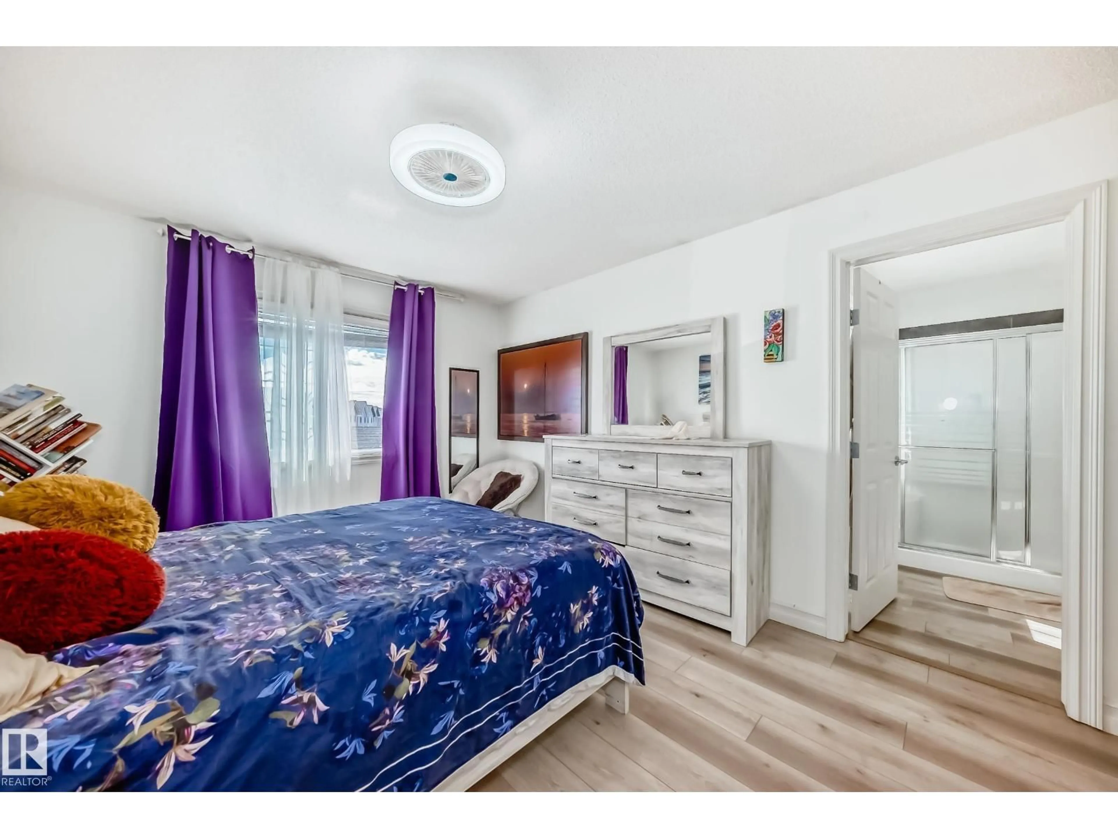 Bedroom with bed, wood/laminate floor for NW - 13418 166 AV, Edmonton Alberta T6V0G6
