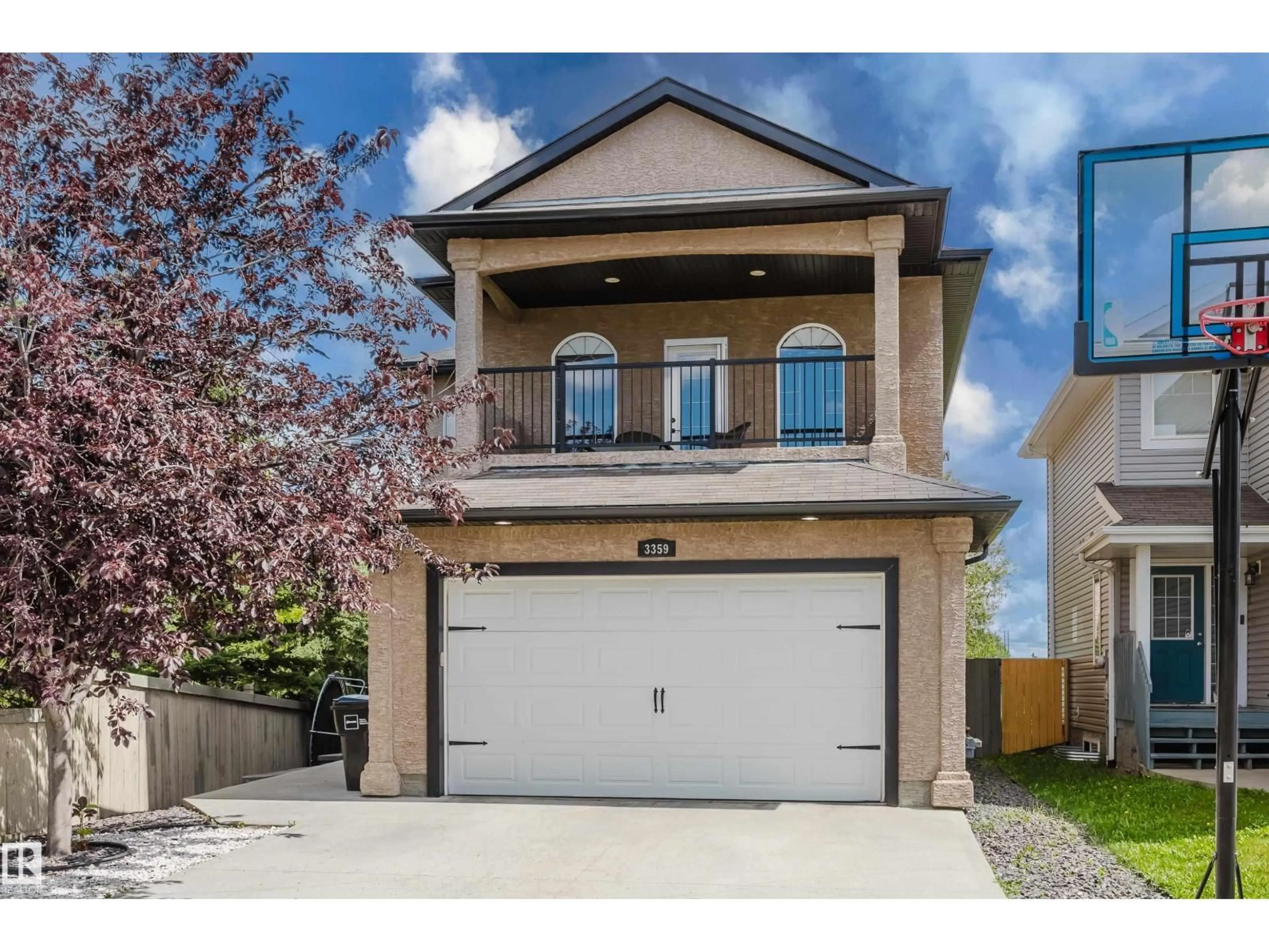 Home with vinyl exterior material, street for 3359 18 ST, Edmonton Alberta T6T0H4