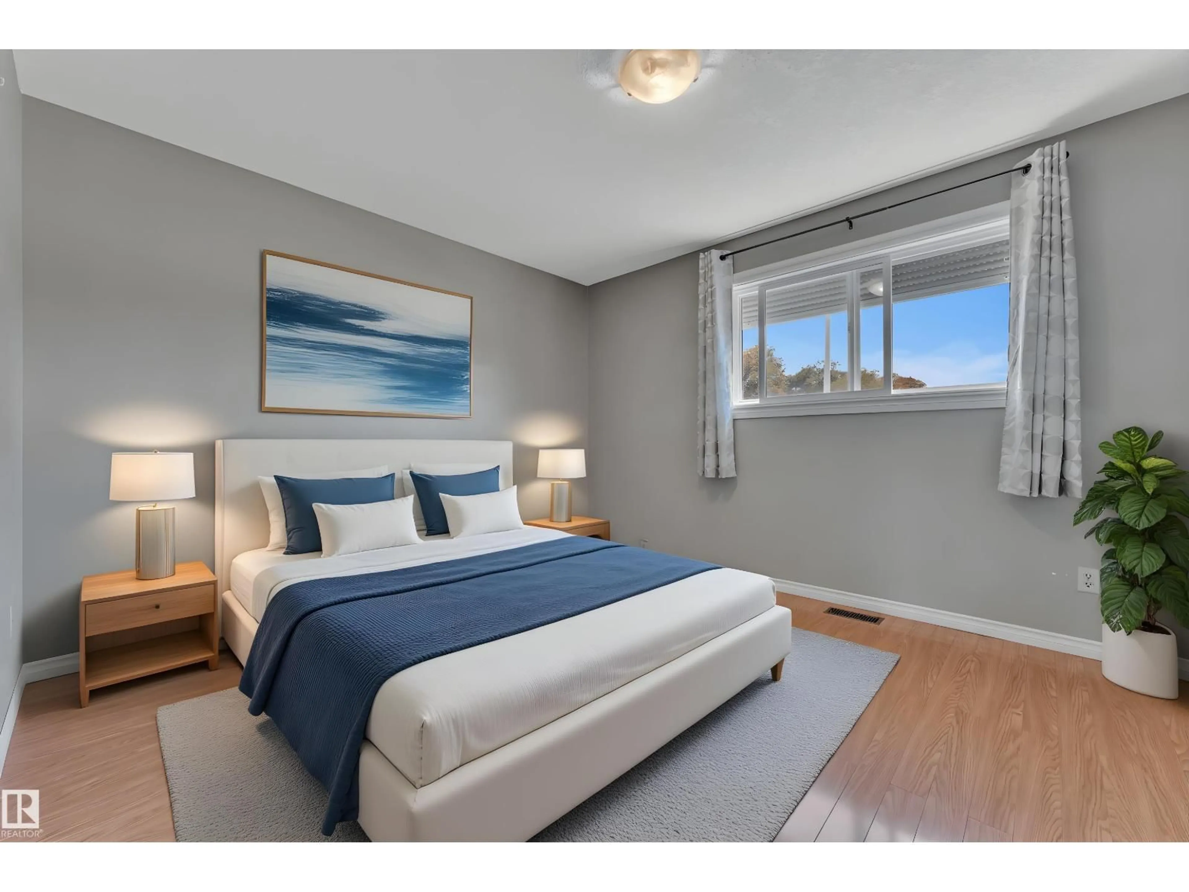 Bedroom with bed, wood/laminate floor for 9320 150 AV, Edmonton Alberta T5E2N8