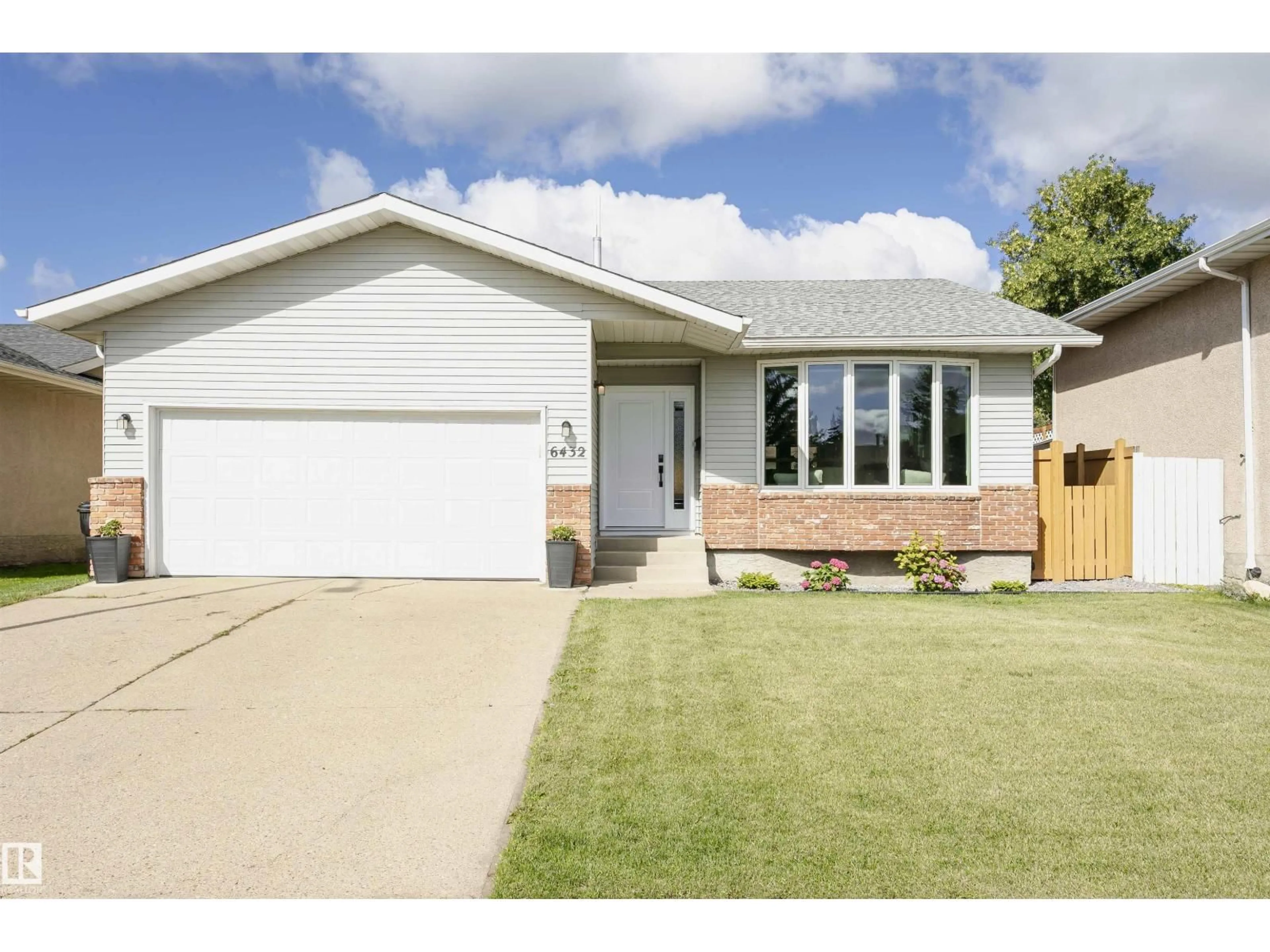 Home with vinyl exterior material, street for NW - 6432 187 ST E, Edmonton Alberta T5T2N3