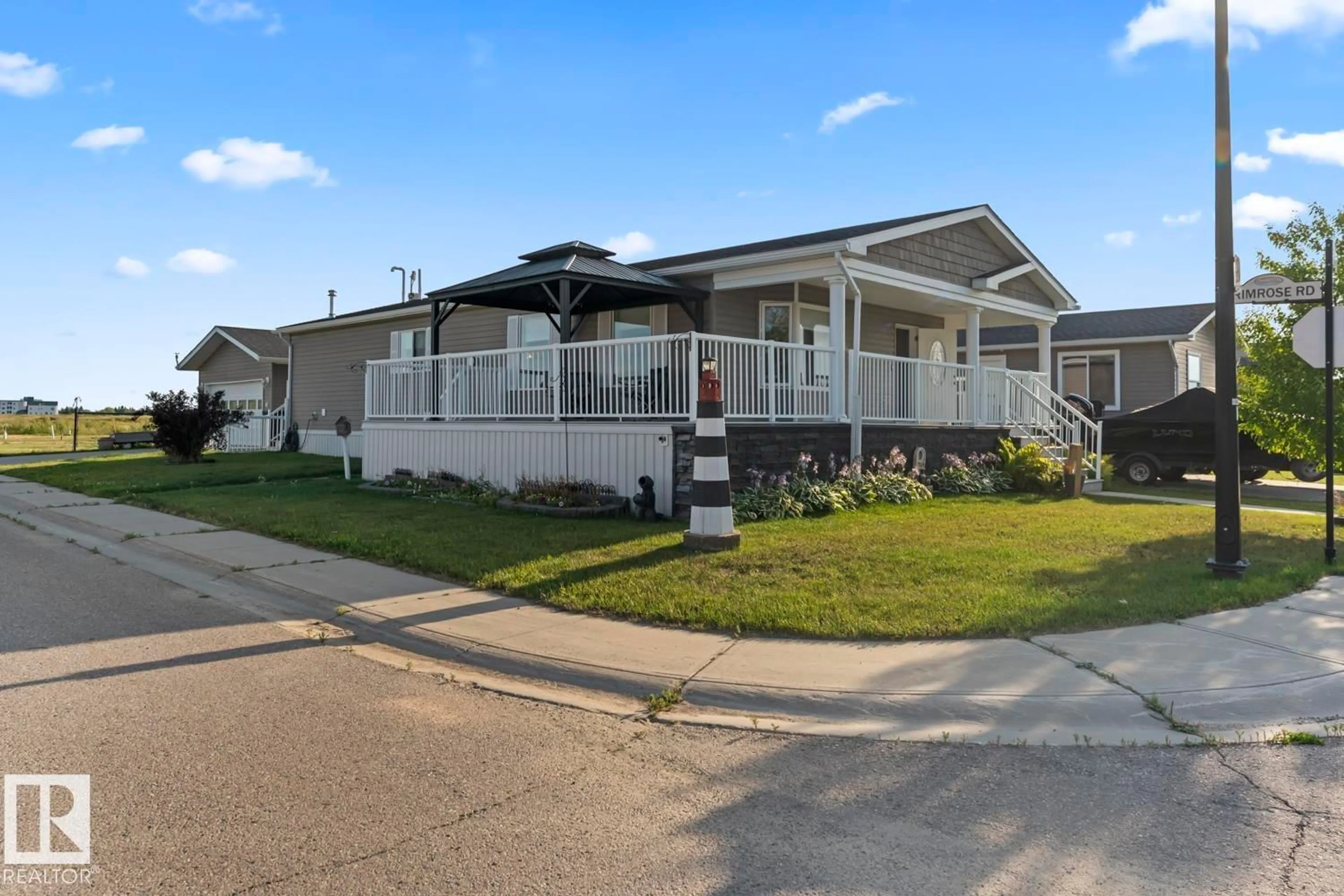 Home with vinyl exterior material, street for 4501 SNOWBIRD LN, Cold Lake Alberta T9M0C6