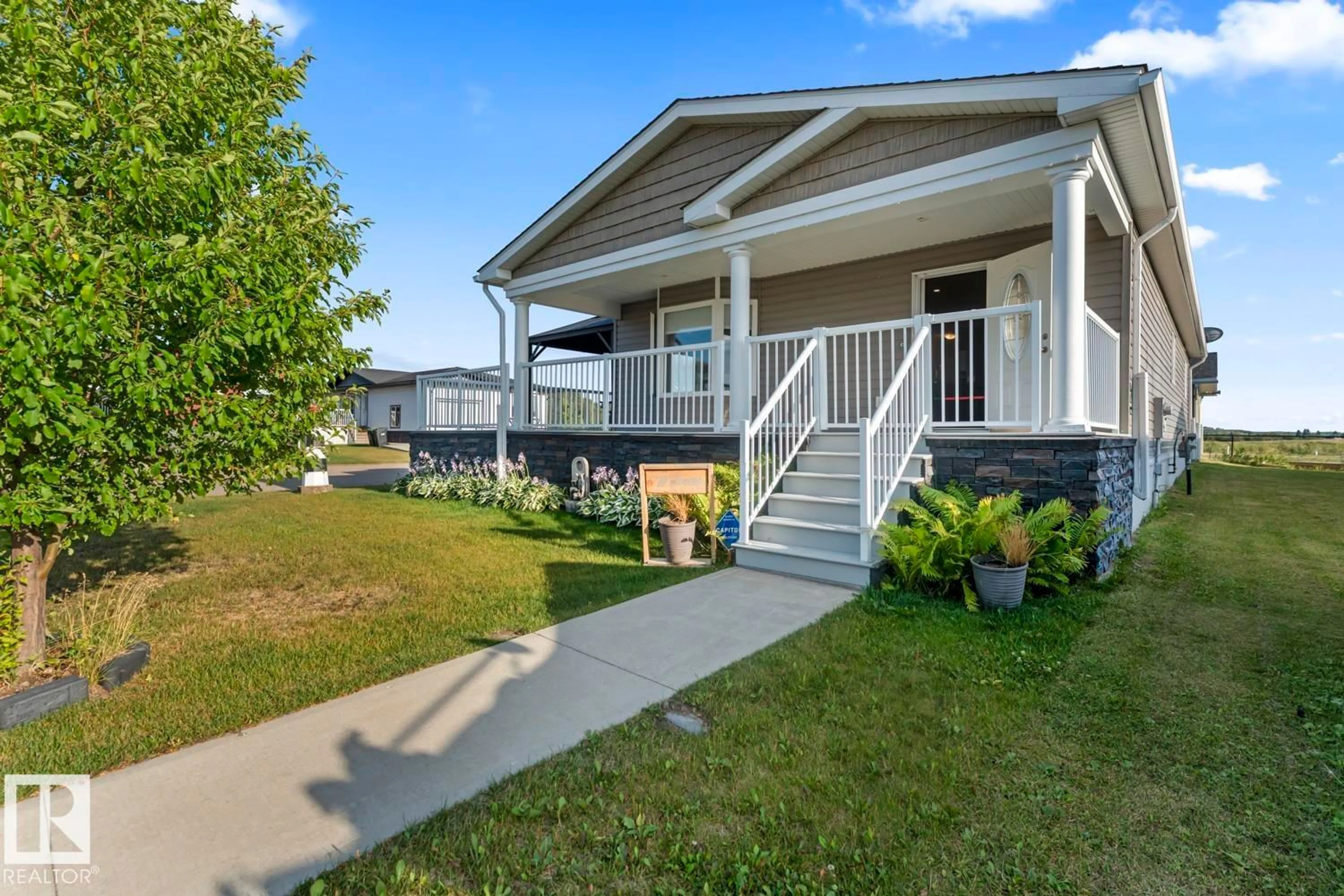 Home with vinyl exterior material, street for 4501 SNOWBIRD LN, Cold Lake Alberta T9M0C6