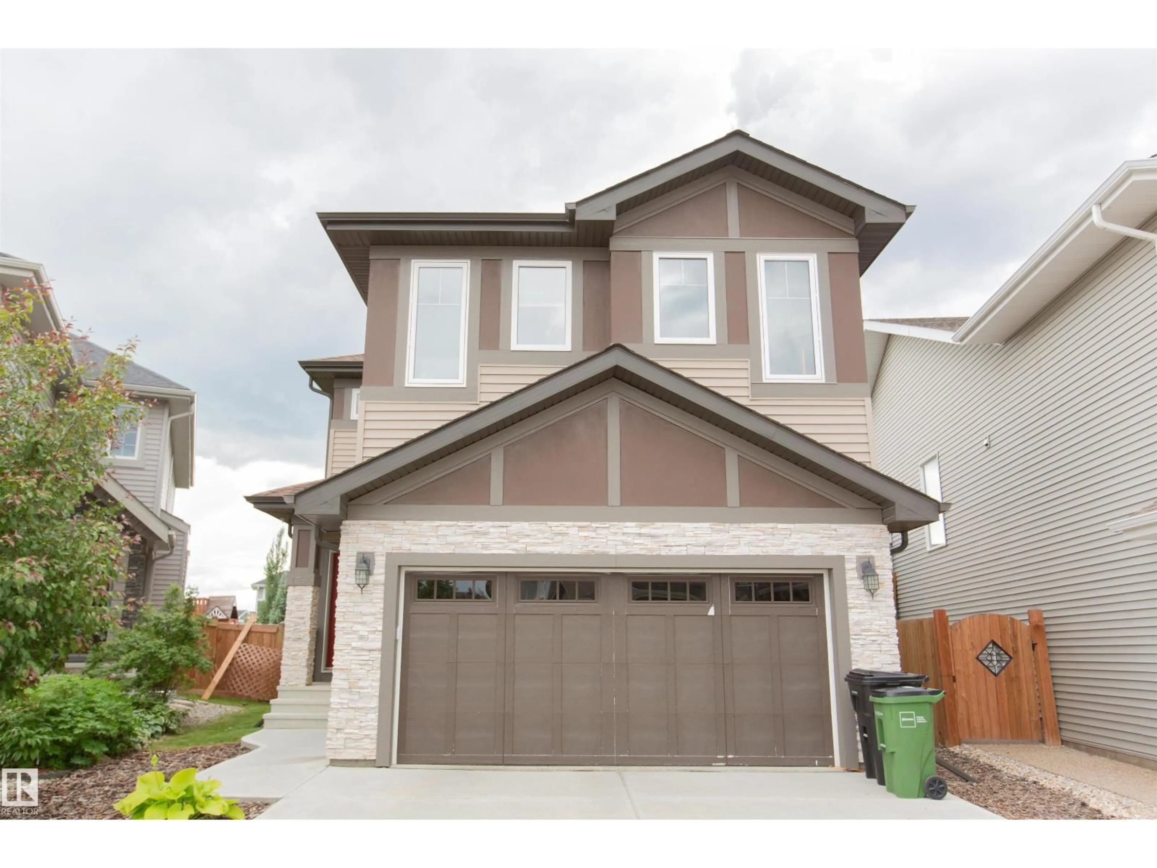 Home with vinyl exterior material, street for SW - 1736 162 ST, Edmonton Alberta T6W3E8
