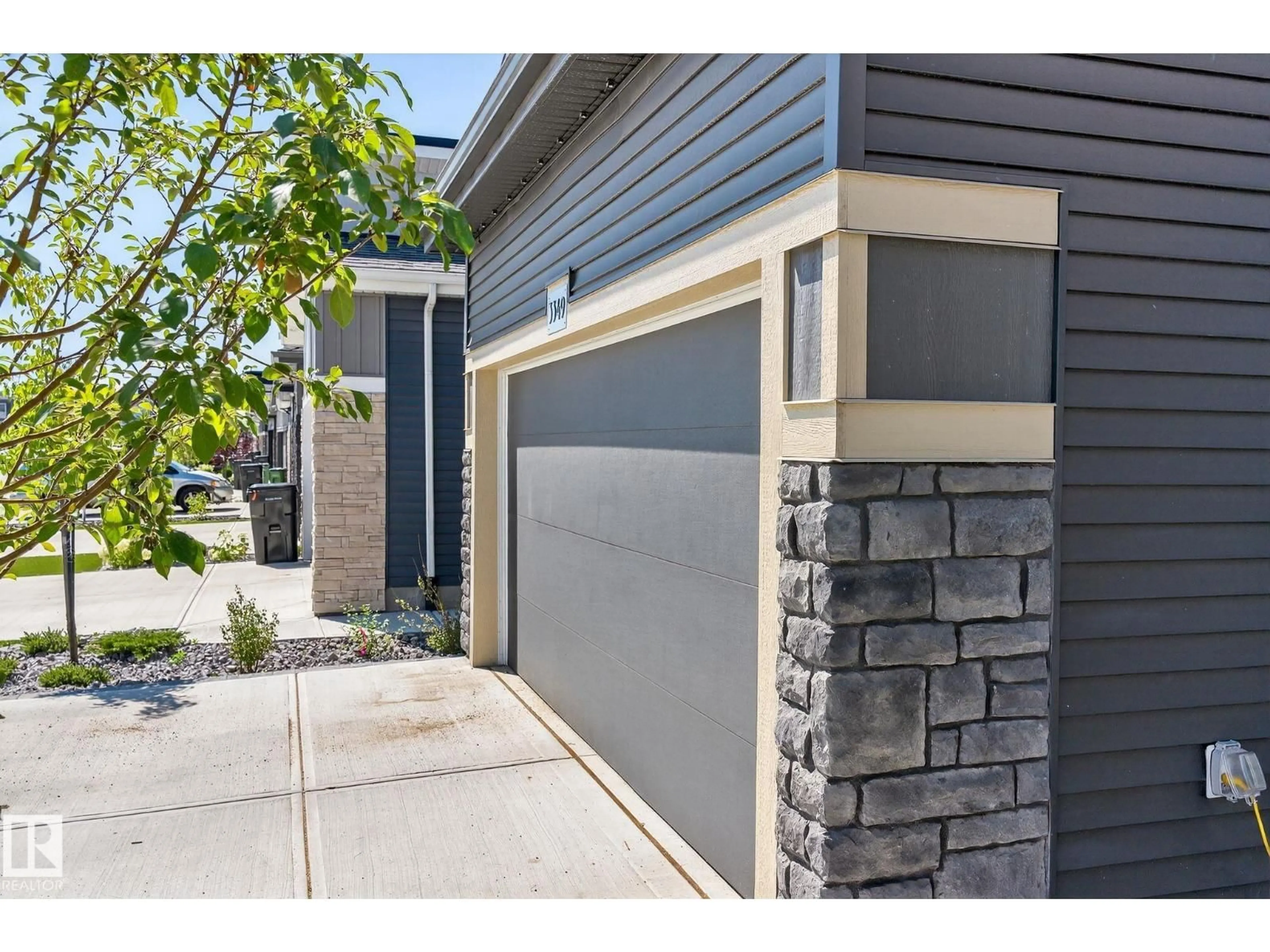 Home with vinyl exterior material, street for SW - 3349 KULAY WY, Edmonton Alberta T6W5E7
