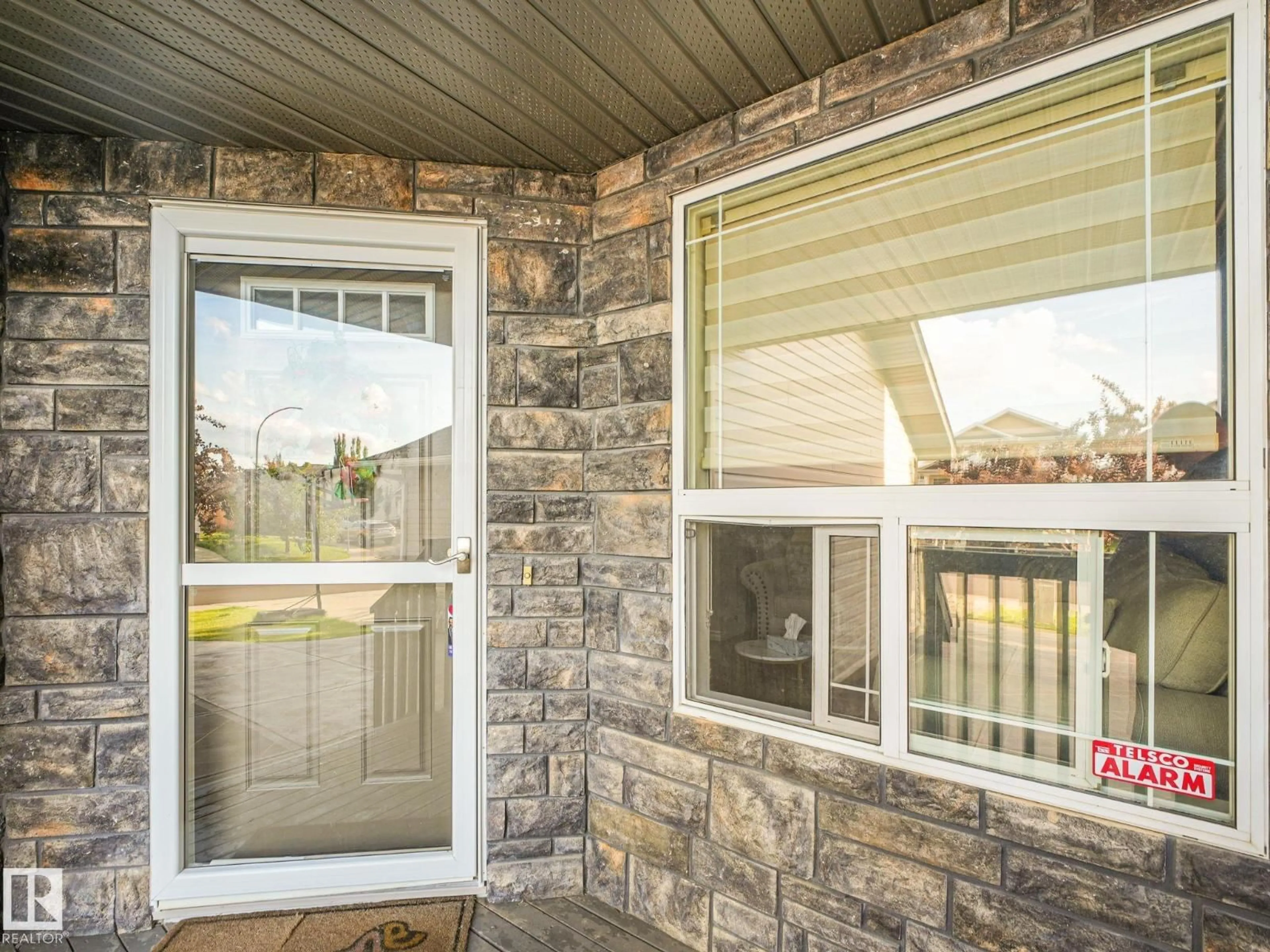 Home with vinyl exterior material, street for 11807 170 AV, Edmonton Alberta T5X6H8