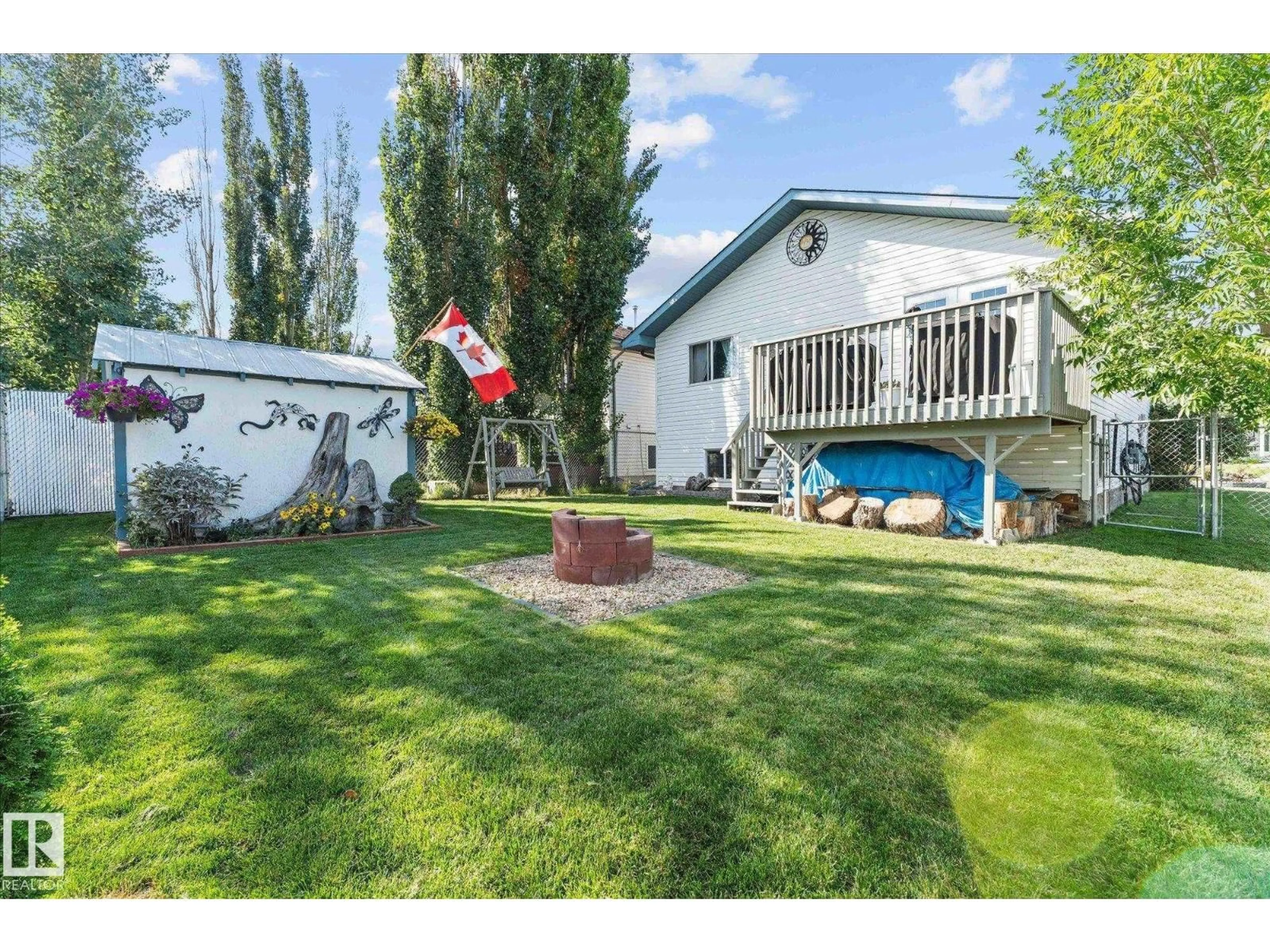 A pic from outside/outdoor area/front of a property/back of a property/a pic from drone, mountain view for 13 DEER PARK RD, Spruce Grove Alberta T7X3K2