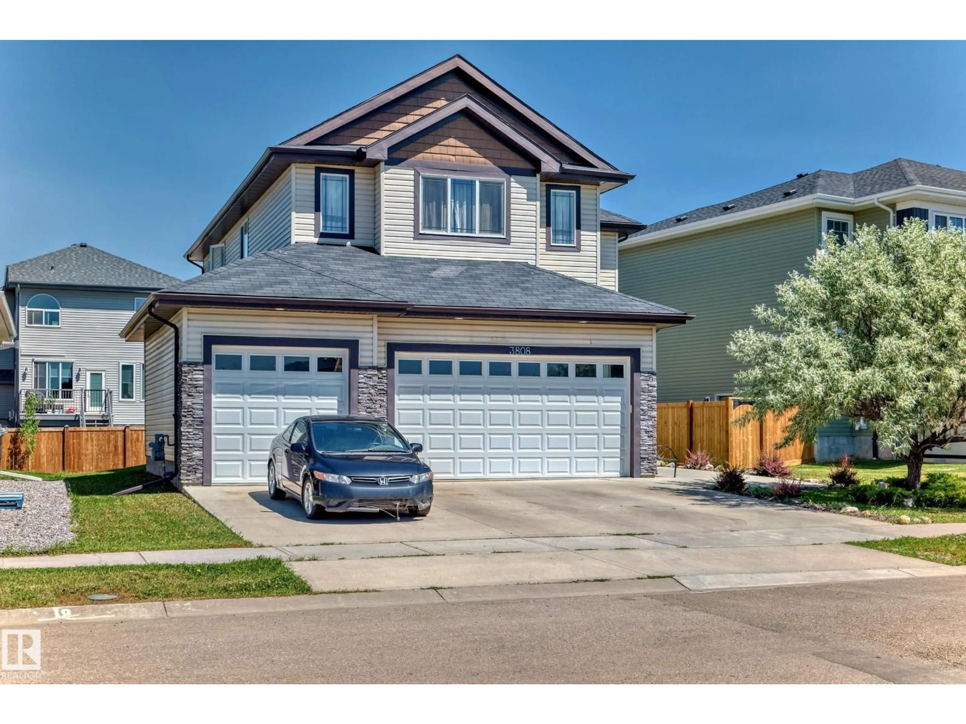 Home with vinyl exterior material, street for 3808 TRIOMPHE BV, Beaumont Alberta T4X0C4