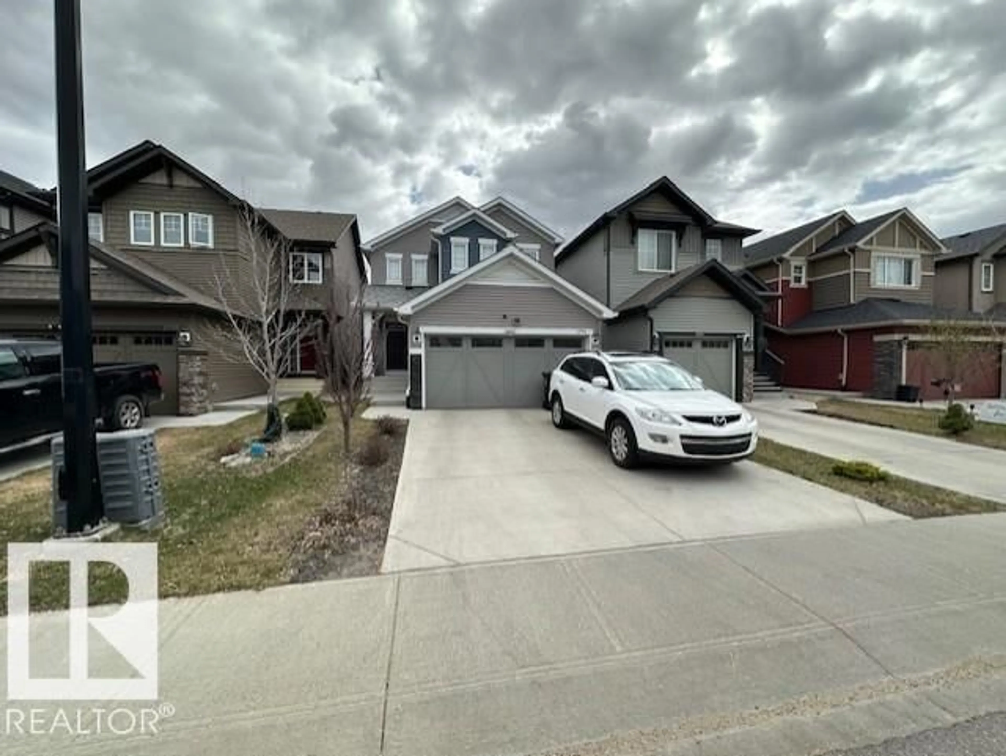 A pic from outside/outdoor area/front of a property/back of a property/a pic from drone, street for 1761 DUMONT CR, Edmonton Alberta T6W3V8