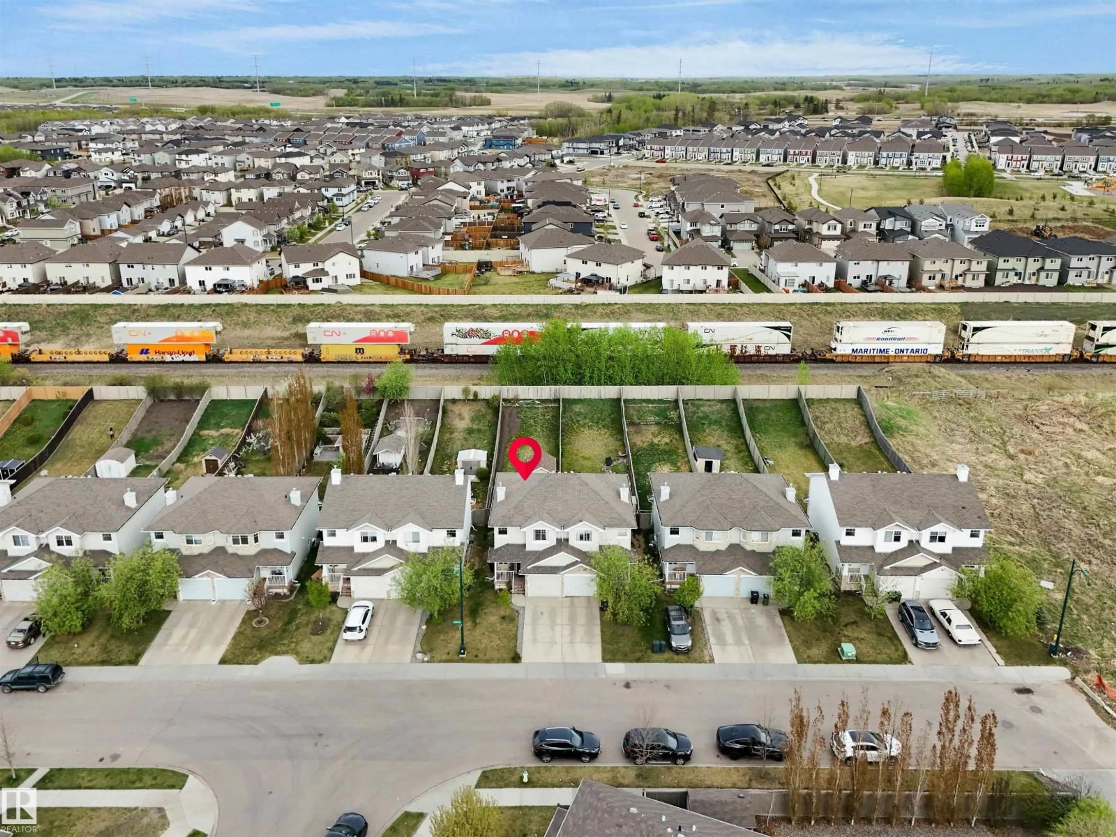 A pic from outside/outdoor area/front of a property/back of a property/a pic from drone, street for 3455 11 ST, Edmonton Alberta T6T0J8