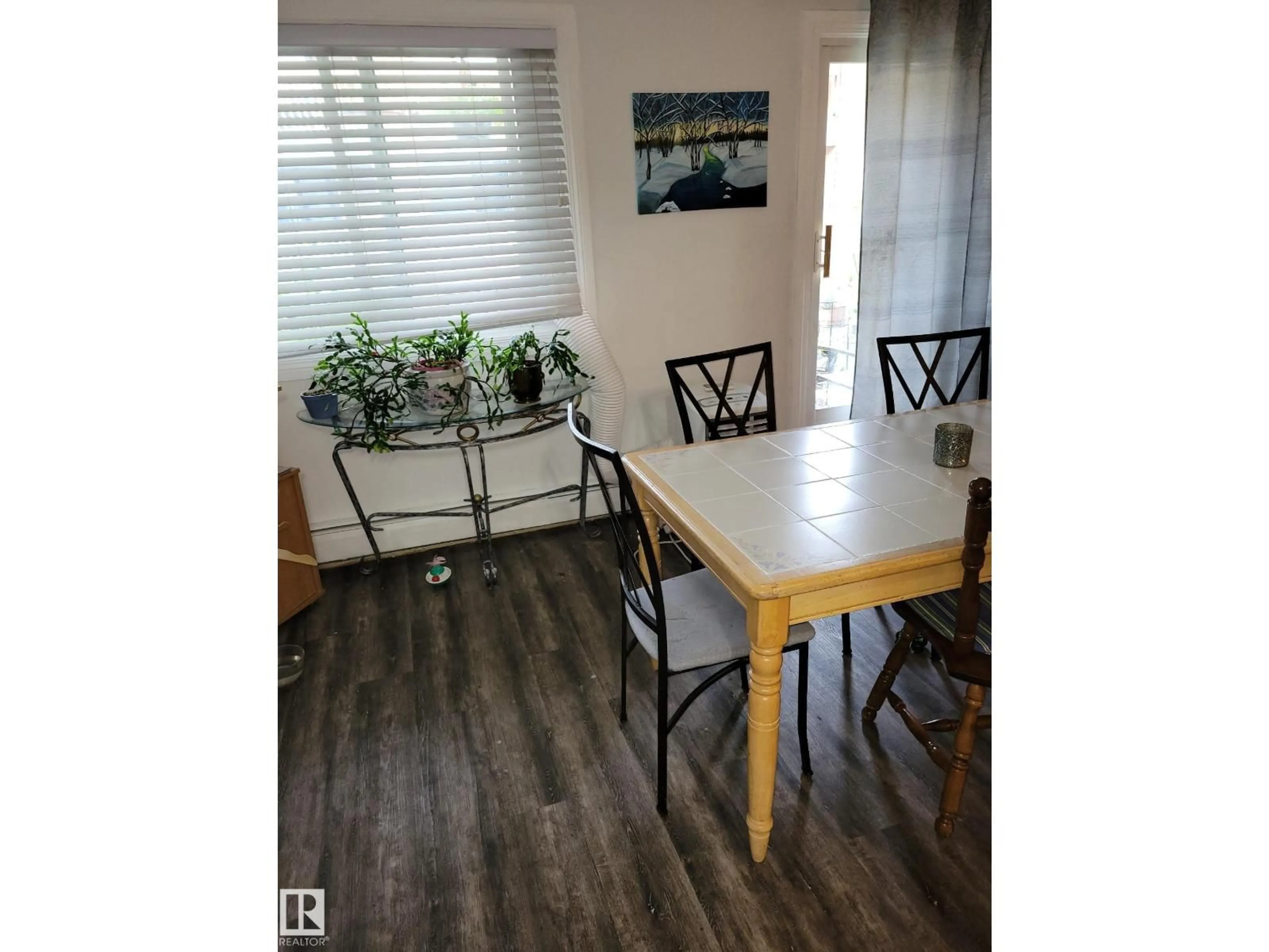 Dining room, wood/laminate floor for 202 - 14825 51 AV, Edmonton Alberta T6H5G4