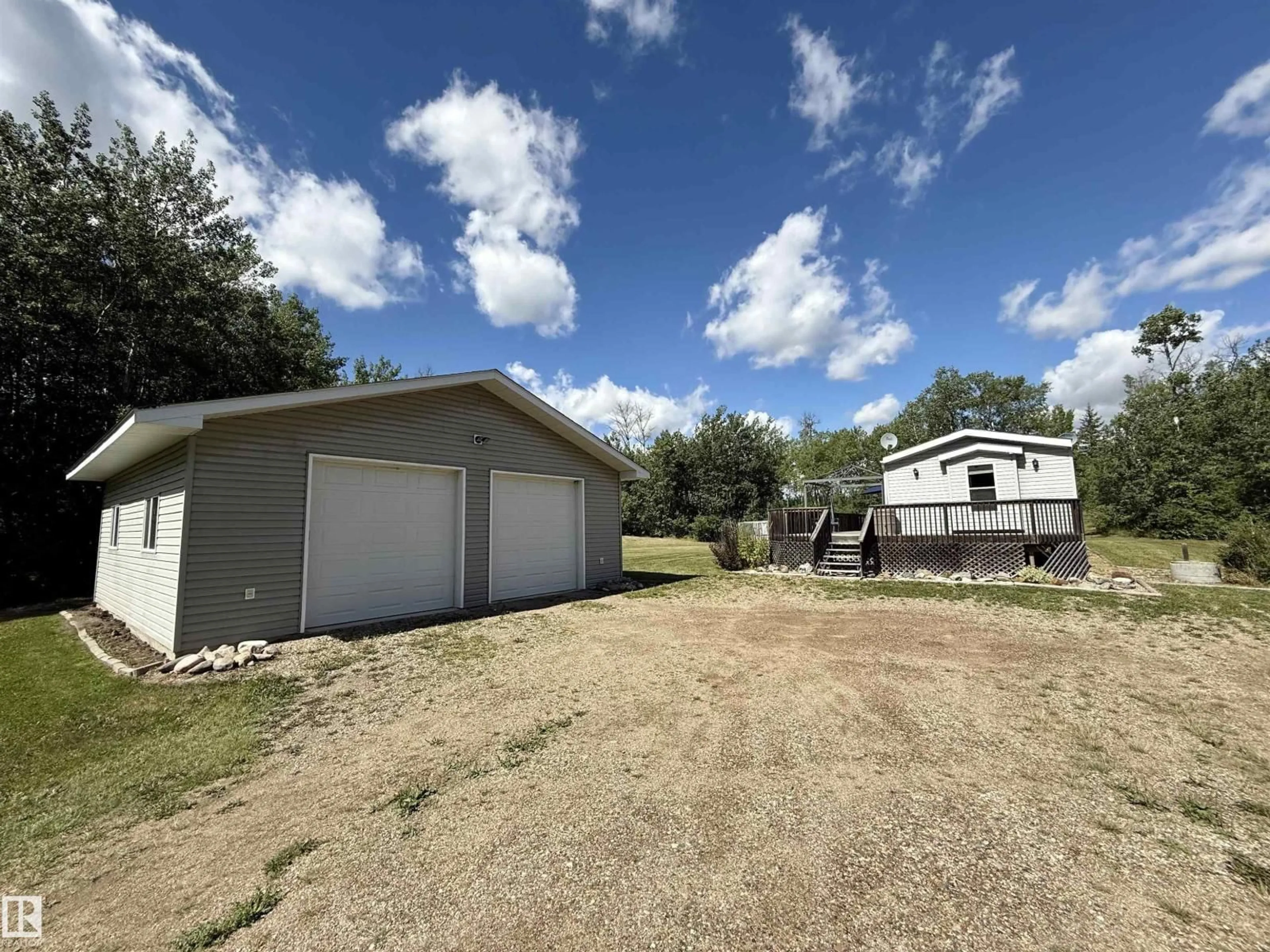 A pic from outside/outdoor area/front of a property/back of a property/a pic from drone, street for 113 - 111 58532 RR, Rural St. Paul County Alberta T0A0C0