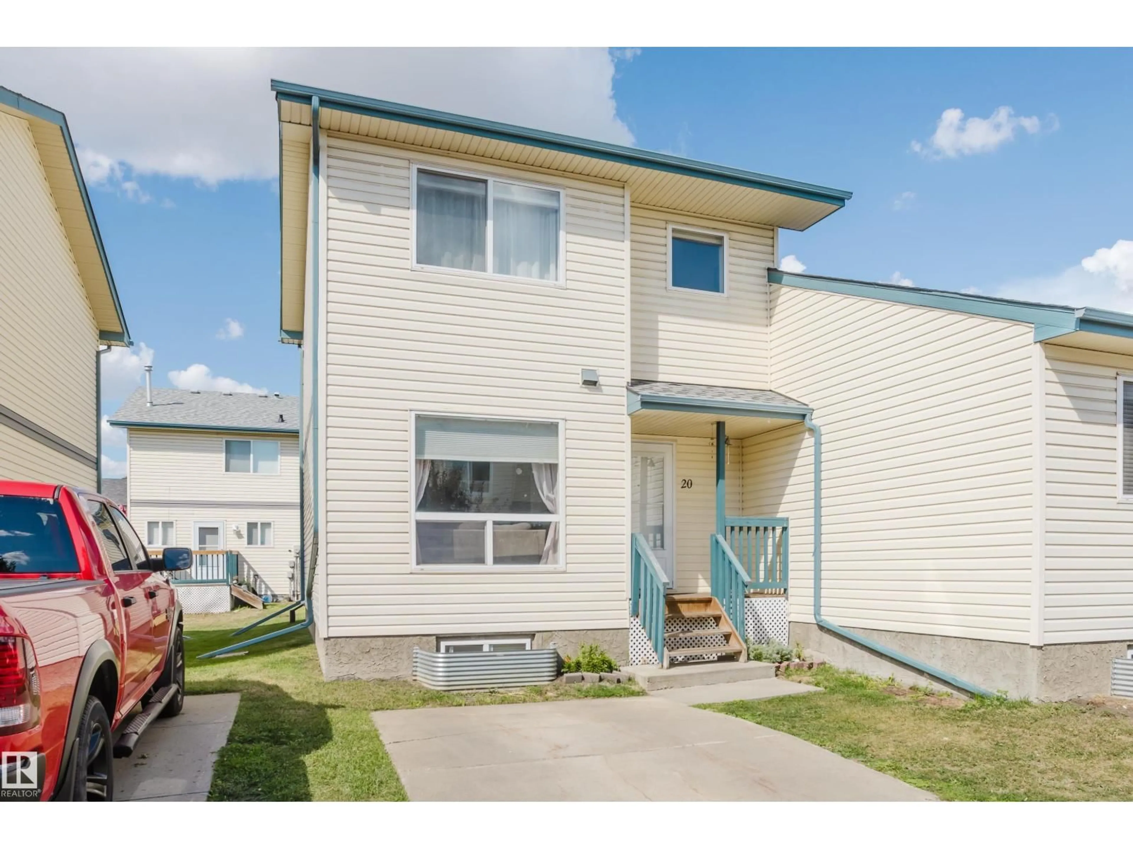 Home with vinyl exterior material, street for 20 10909 106 ST NW, Edmonton Alberta T5H4M7