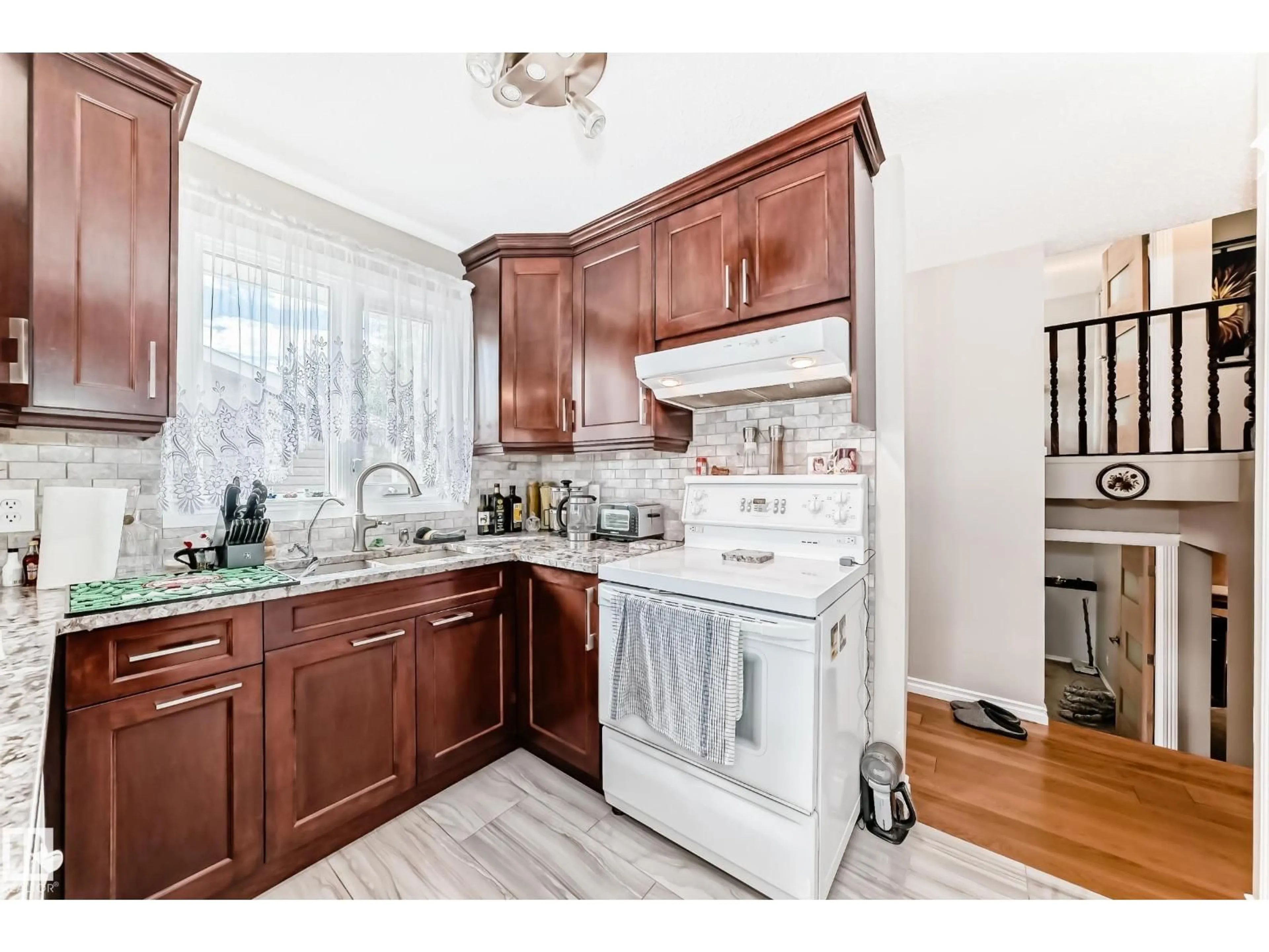 Open concept kitchen, ceramic/tile floor for NW - 14608 29A ST, Edmonton Alberta T5Y2A2