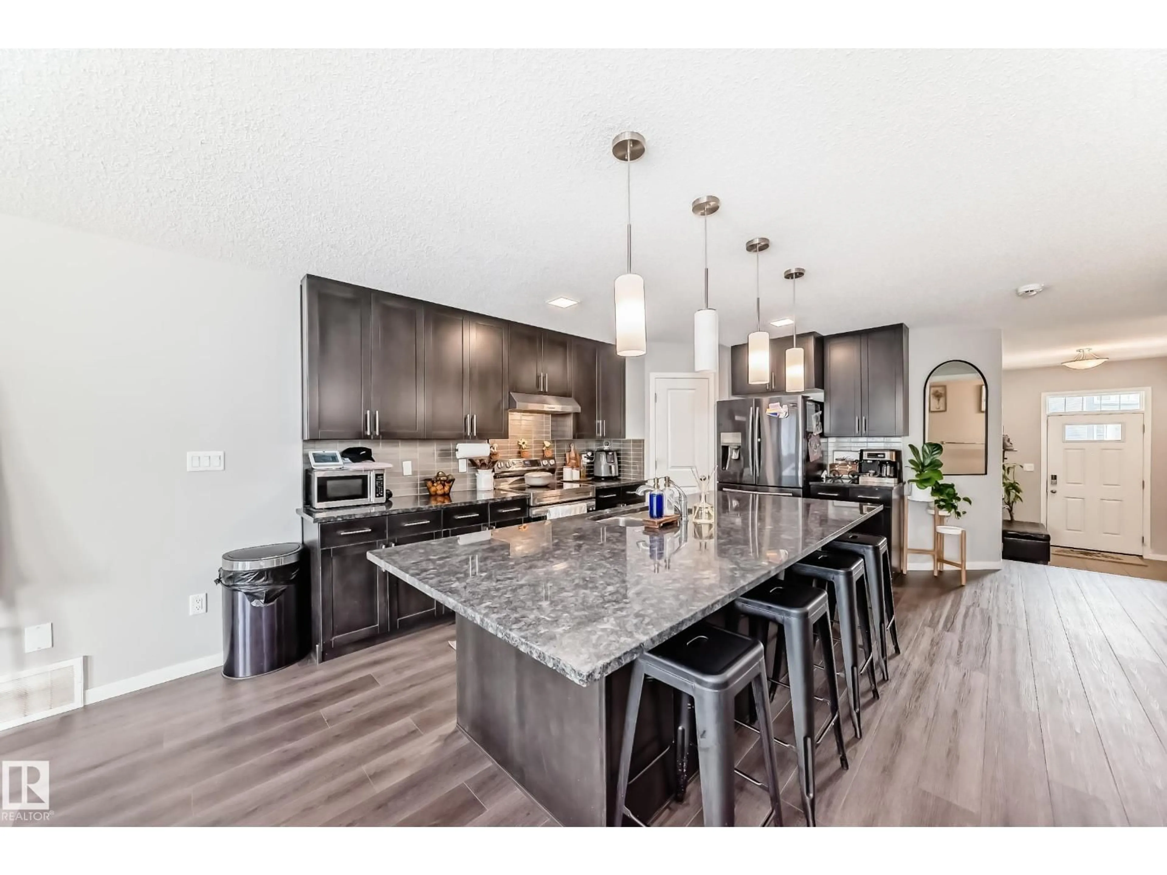 Open concept kitchen, unknown for 2333 82 ST, Edmonton Alberta T6X2J7