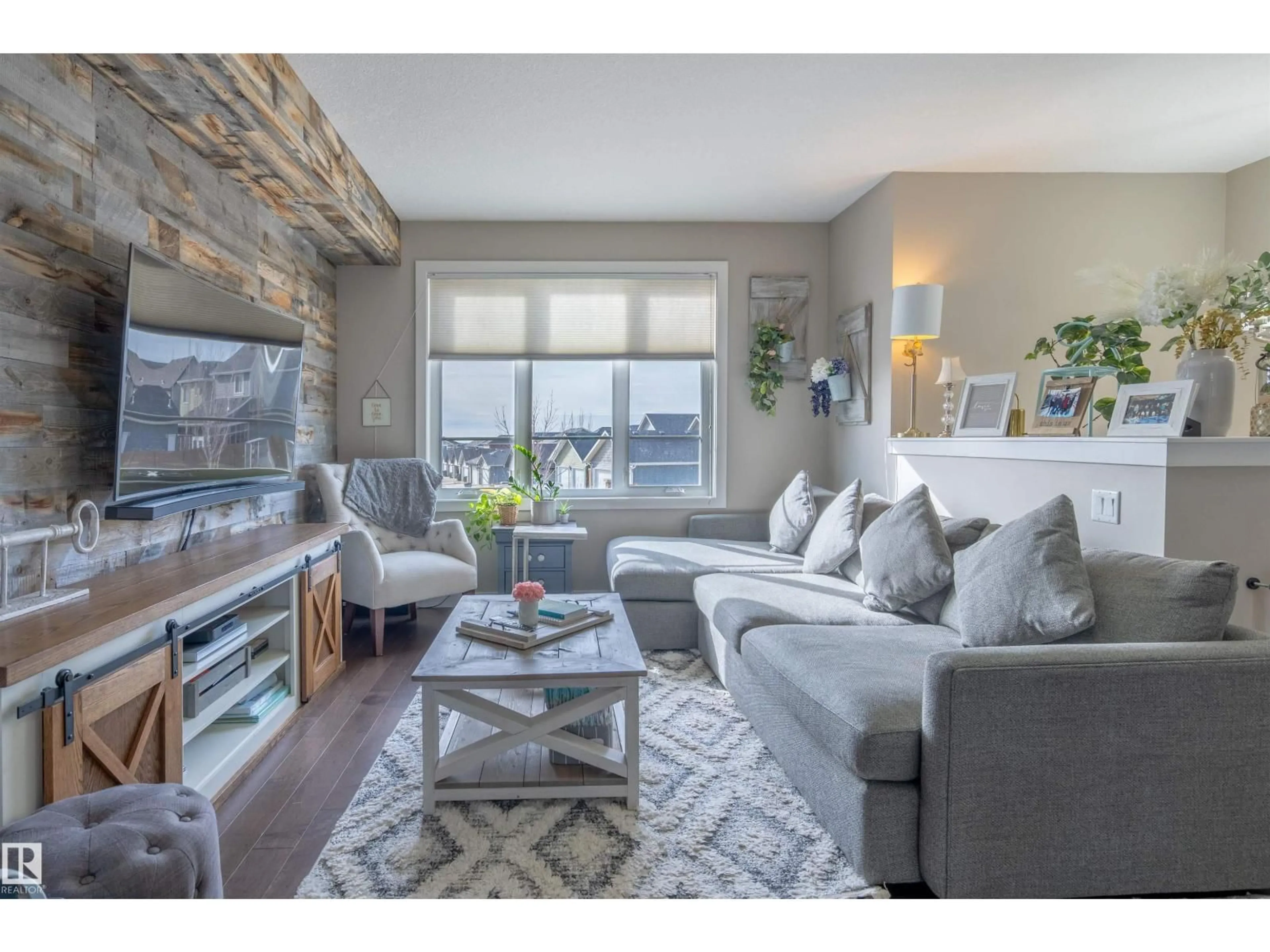 Living room with furniture, wood/laminate floor for #2 - 1480 WATT DR, Edmonton Alberta T6X1T1
