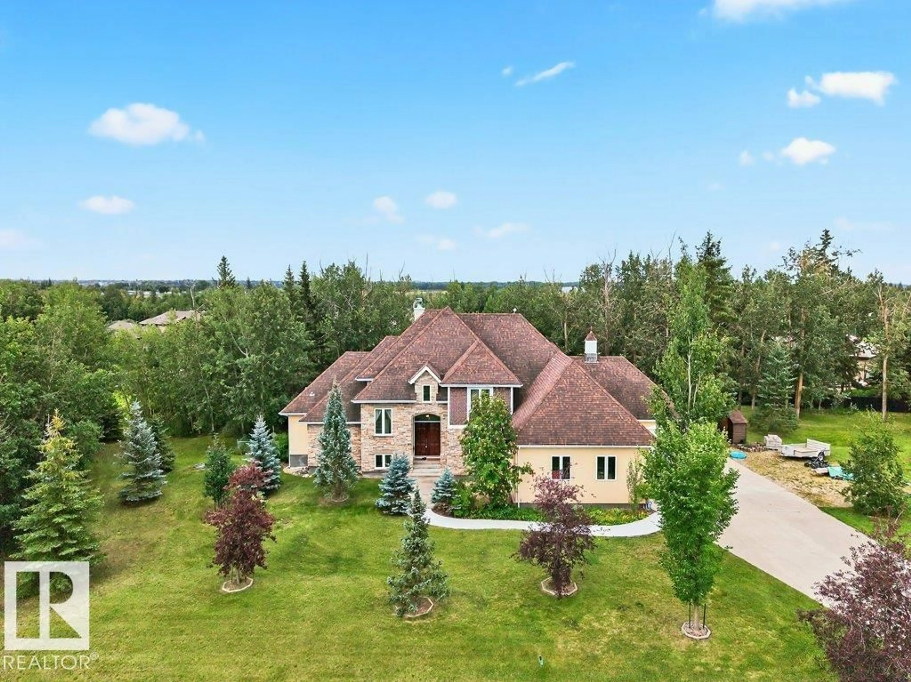 A pic from outside/outdoor area/front of a property/back of a property/a pic from drone, unknown for 53305 - 26 RGE ROAD 273, Rural Parkland County Alberta T7X3N3