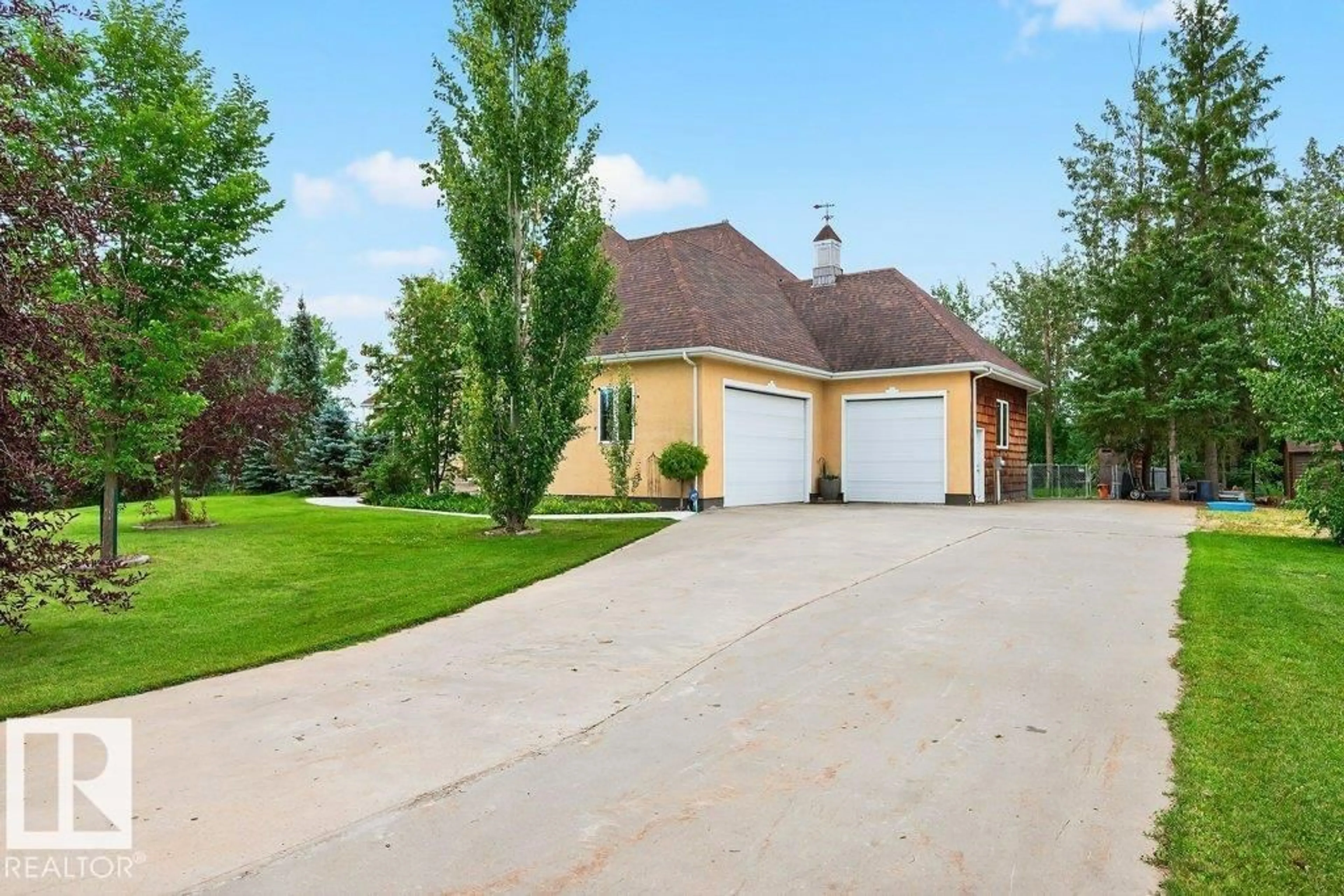 A pic from outside/outdoor area/front of a property/back of a property/a pic from drone, street for 53305 - 26 RGE ROAD 273, Rural Parkland County Alberta T7X3N3
