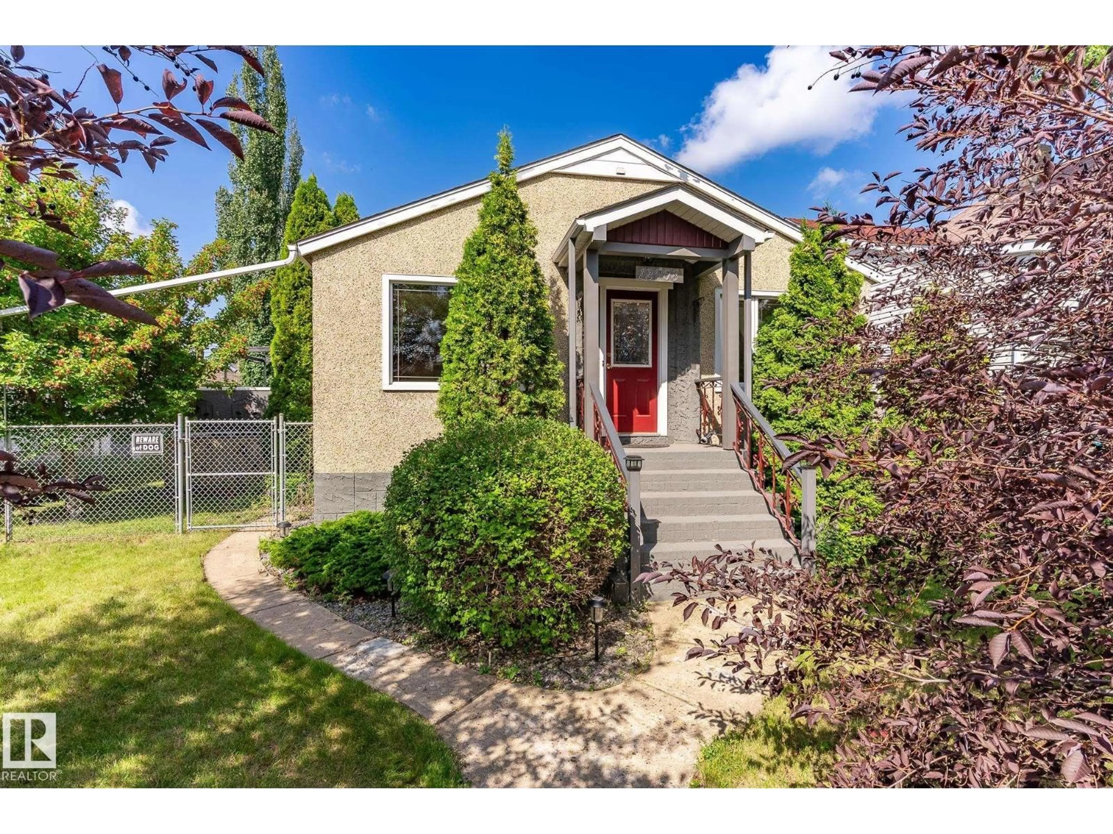 Home with vinyl exterior material, street for NW - 12008 79 ST, Edmonton Alberta T5B2L3