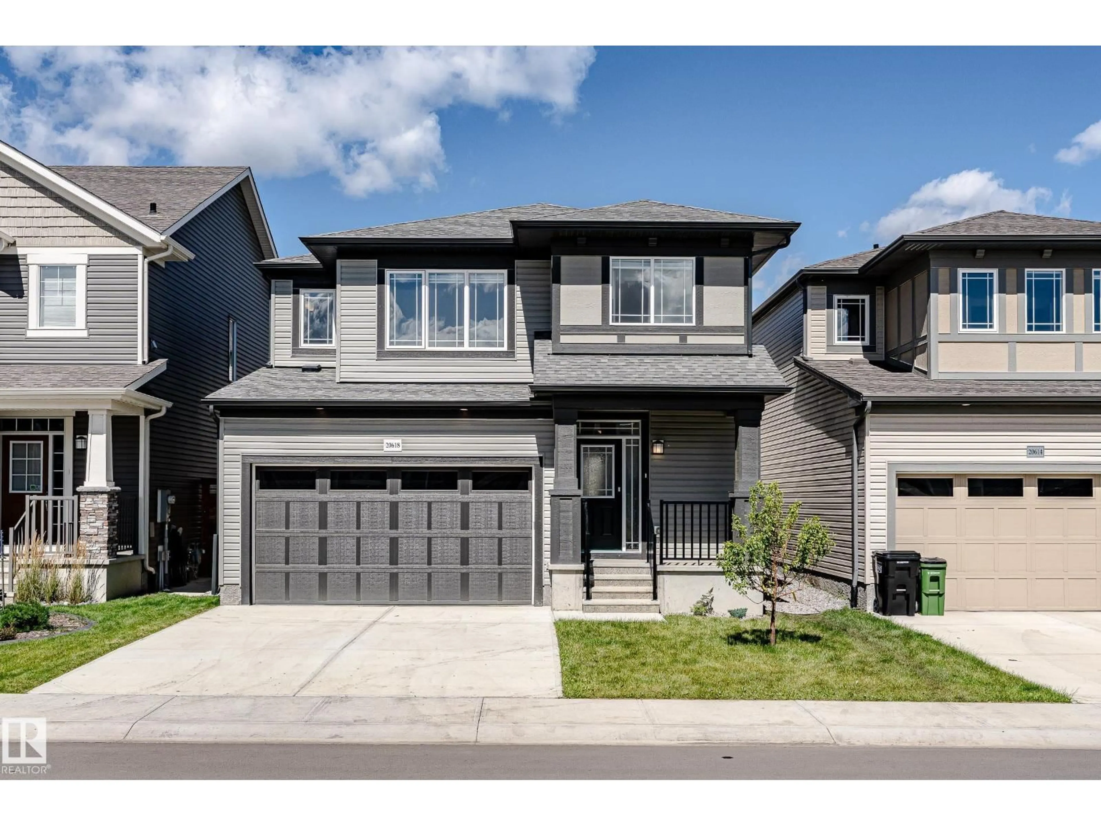 Home with brick exterior material, street for 20618 19A AV, Edmonton Alberta T6M1R6
