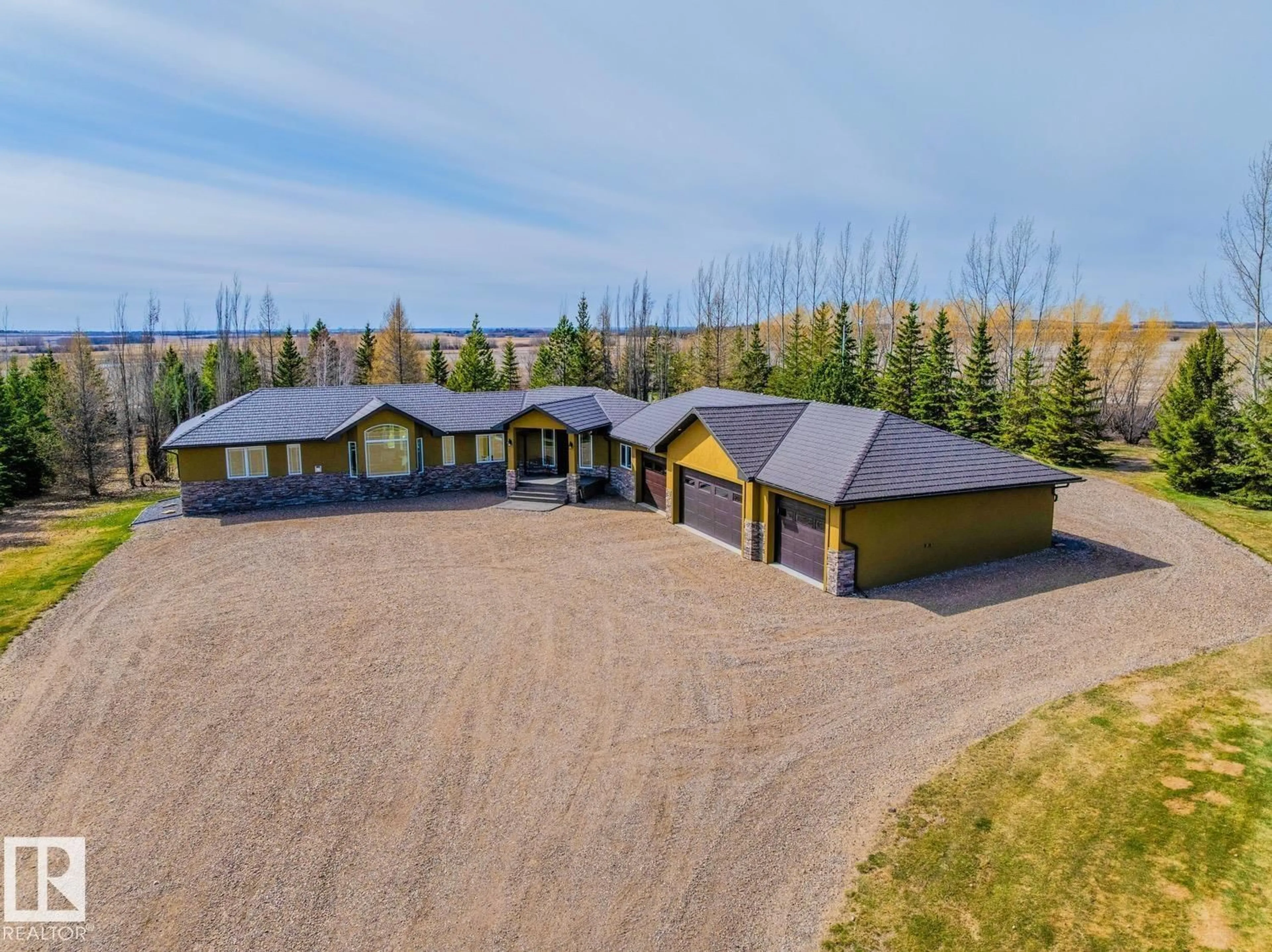 A pic from outside/outdoor area/front of a property/back of a property/a pic from drone, building for 52426 RGE RD 134, Rural Minburn County Alberta T0B2S0