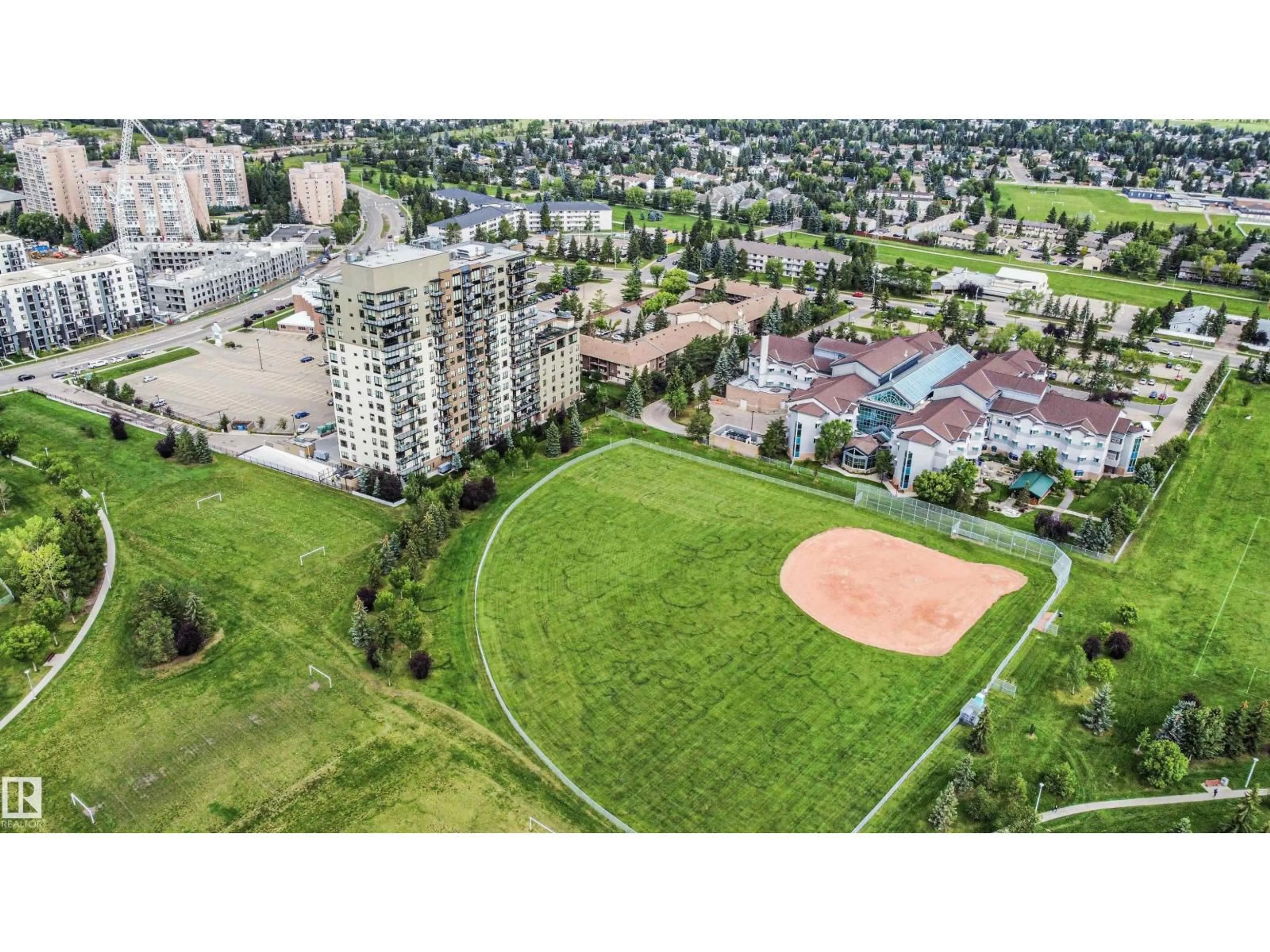 A pic from outside/outdoor area/front of a property/back of a property/a pic from drone, mountain view for #408 - 2755 109 ST, Edmonton Alberta T6J5S4