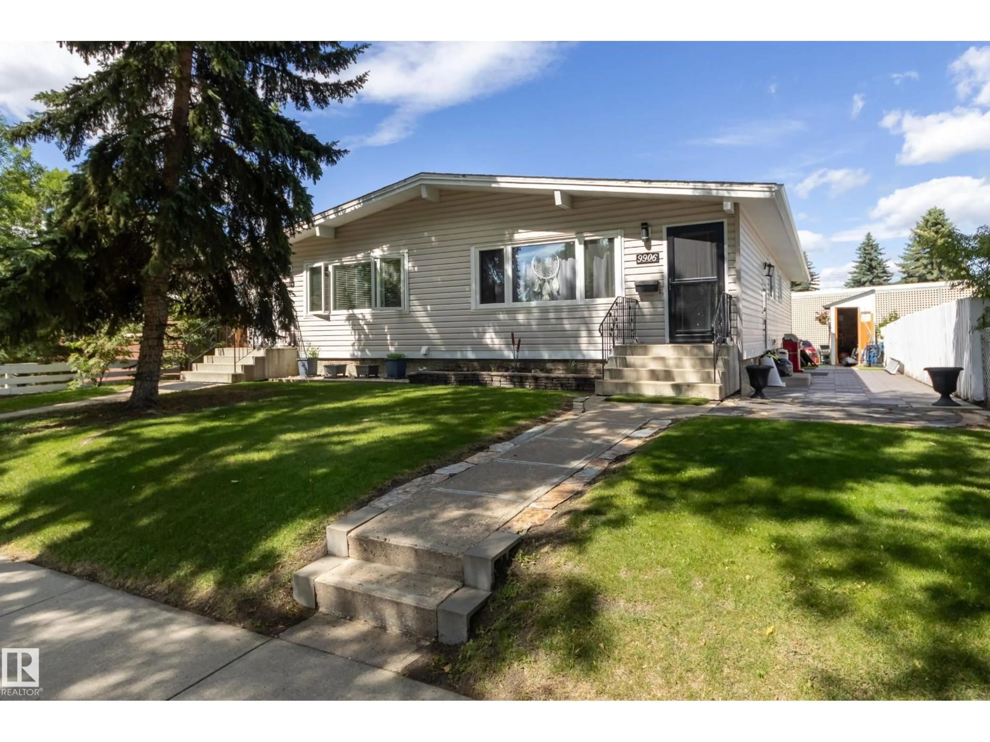 Home with vinyl exterior material, street for 9906 96A AV, Fort Saskatchewan Alberta T8L1P6