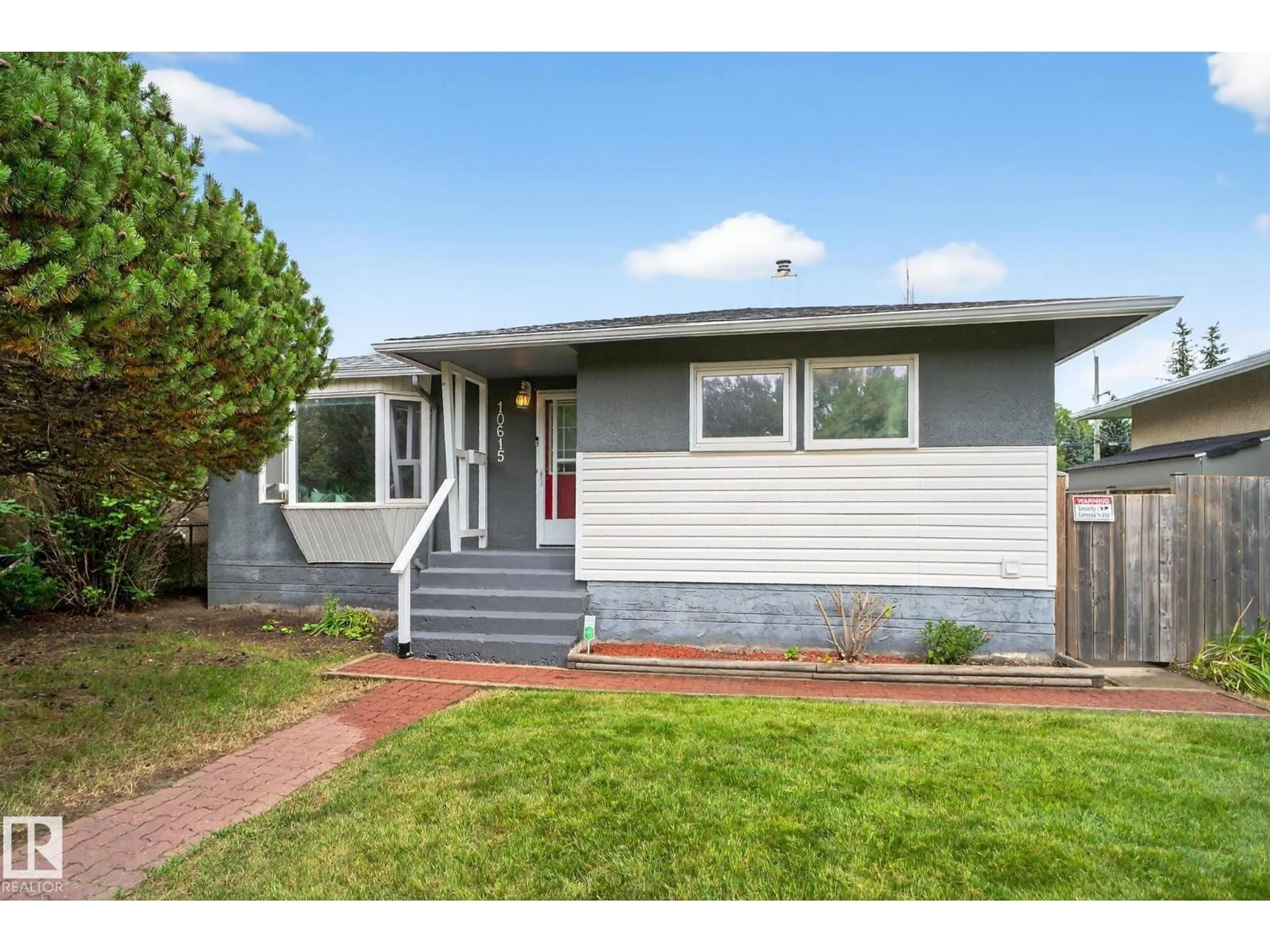 Home with vinyl exterior material, street for NW - 10615 149 ST, Edmonton Alberta T5P1L9