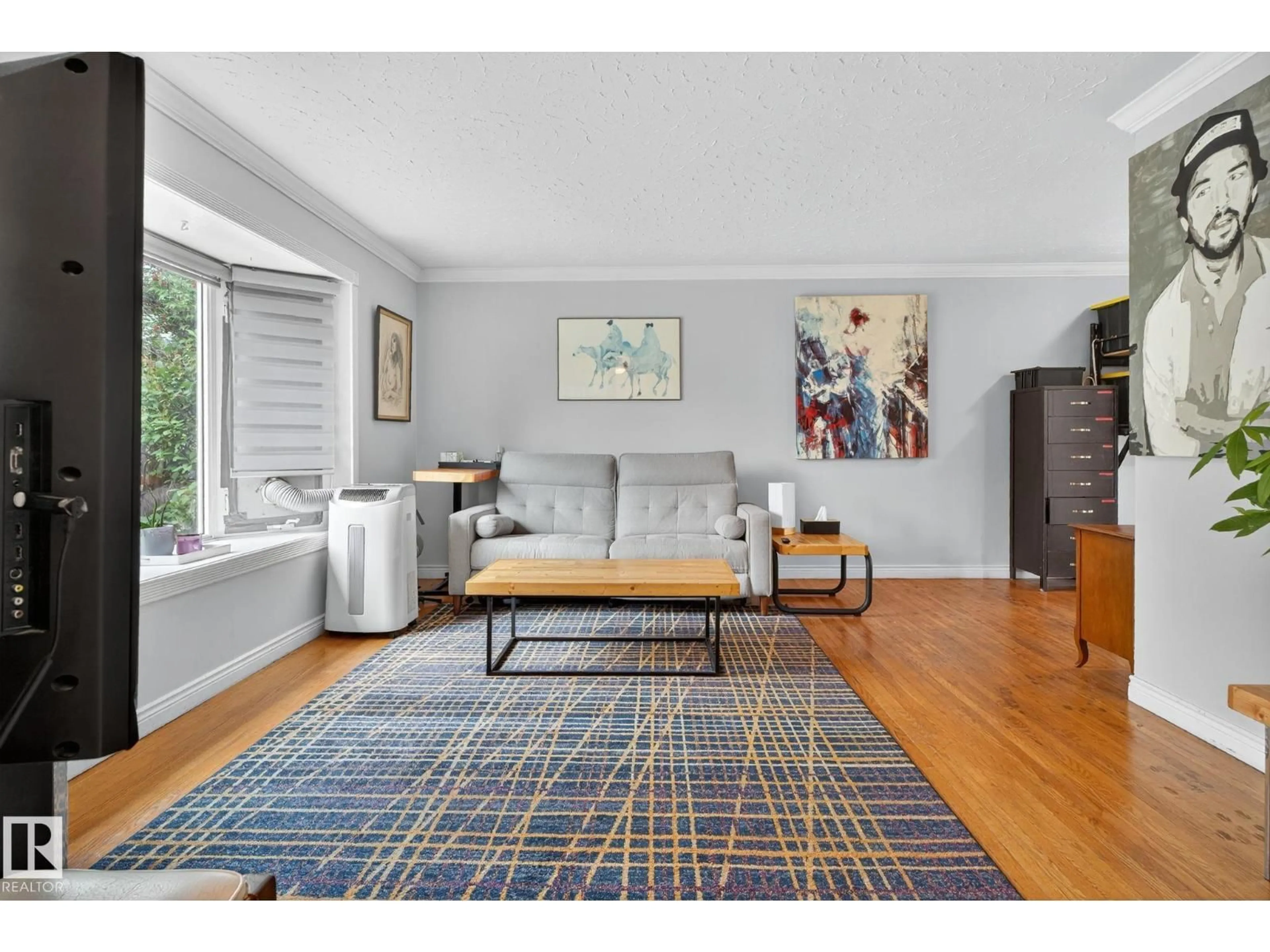 Living room with furniture, unknown for NW - 10615 149 ST, Edmonton Alberta T5P1L9