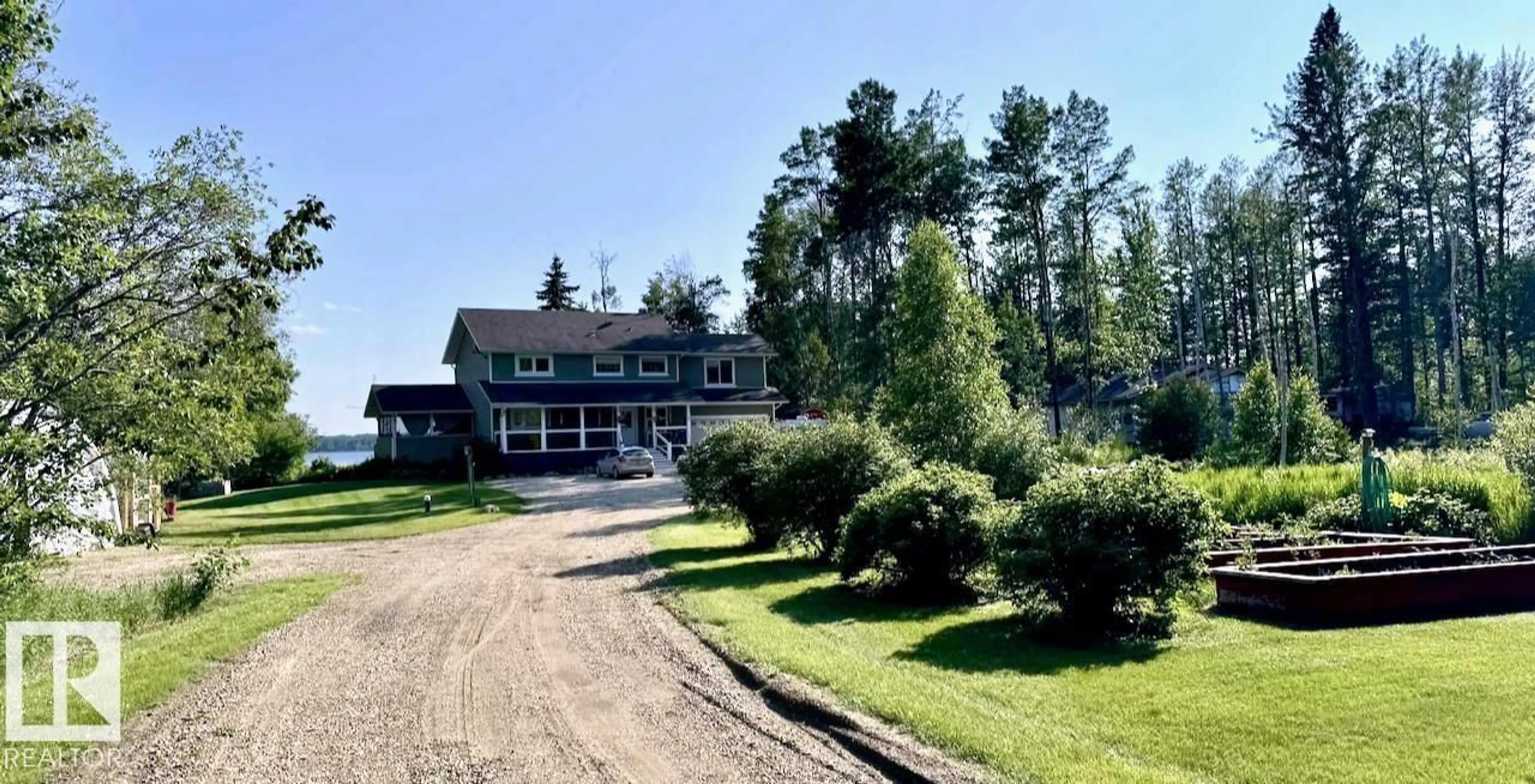 A pic from outside/outdoor area/front of a property/back of a property/a pic from drone, unknown for 310 55530 RGE ROAD 52, Rural Lac Ste. Anne County Alberta T0E0J0