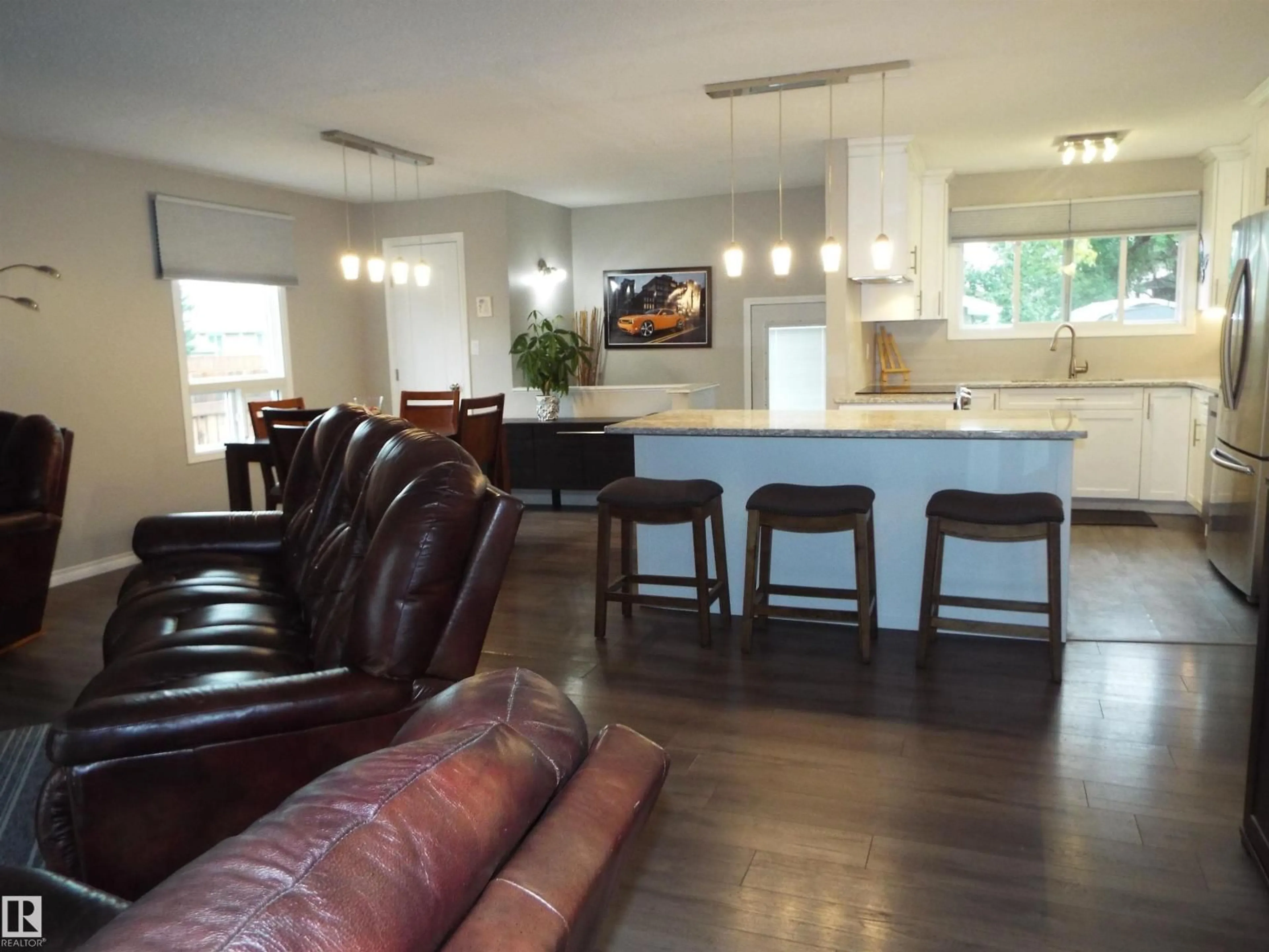 Open concept kitchen, wood/laminate floor for 3614 CALEDONIA DR, Leduc Alberta T9E6G4