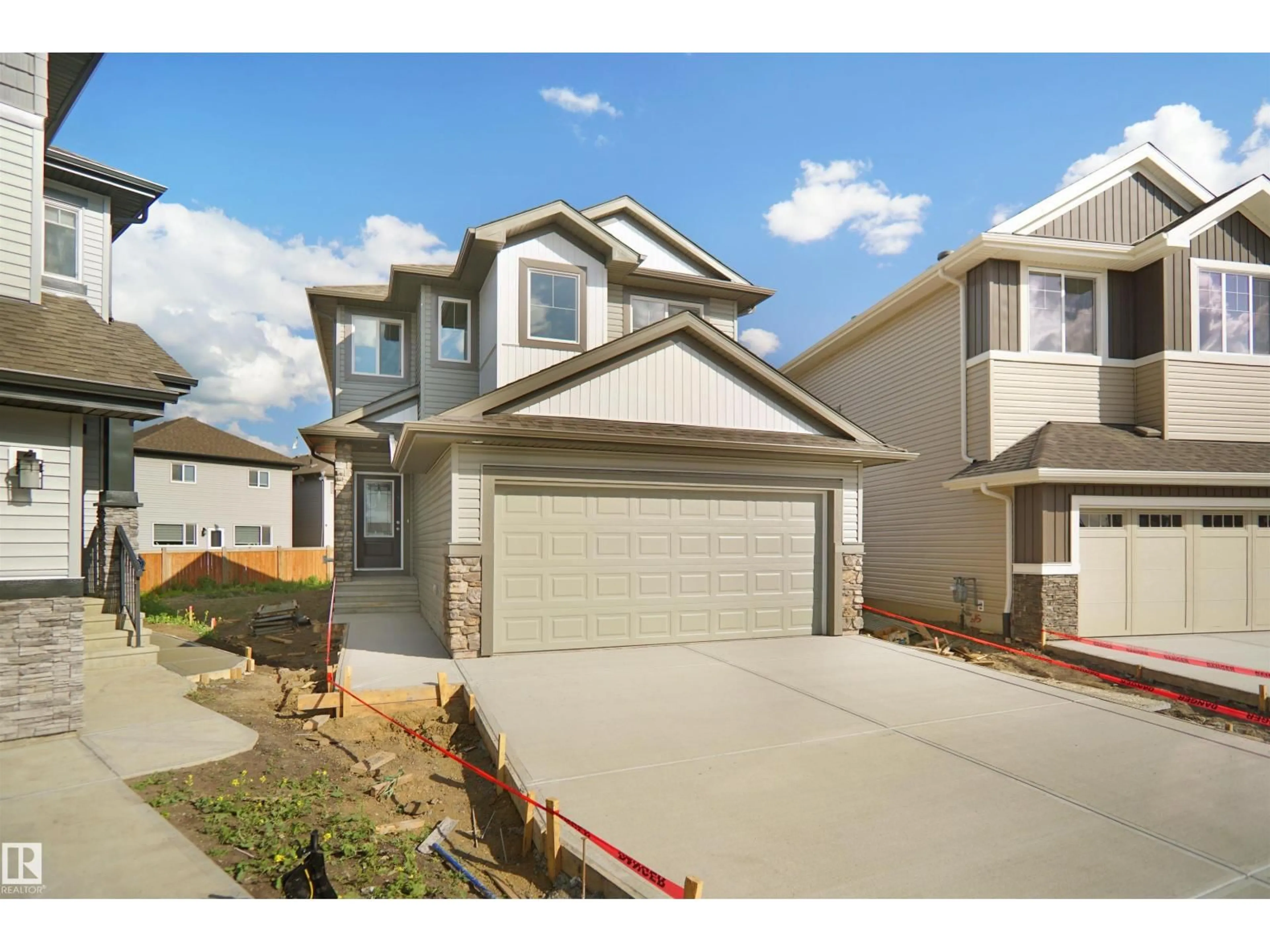 Home with vinyl exterior material, street for 1503 26 ST, Edmonton Alberta T6T2R6