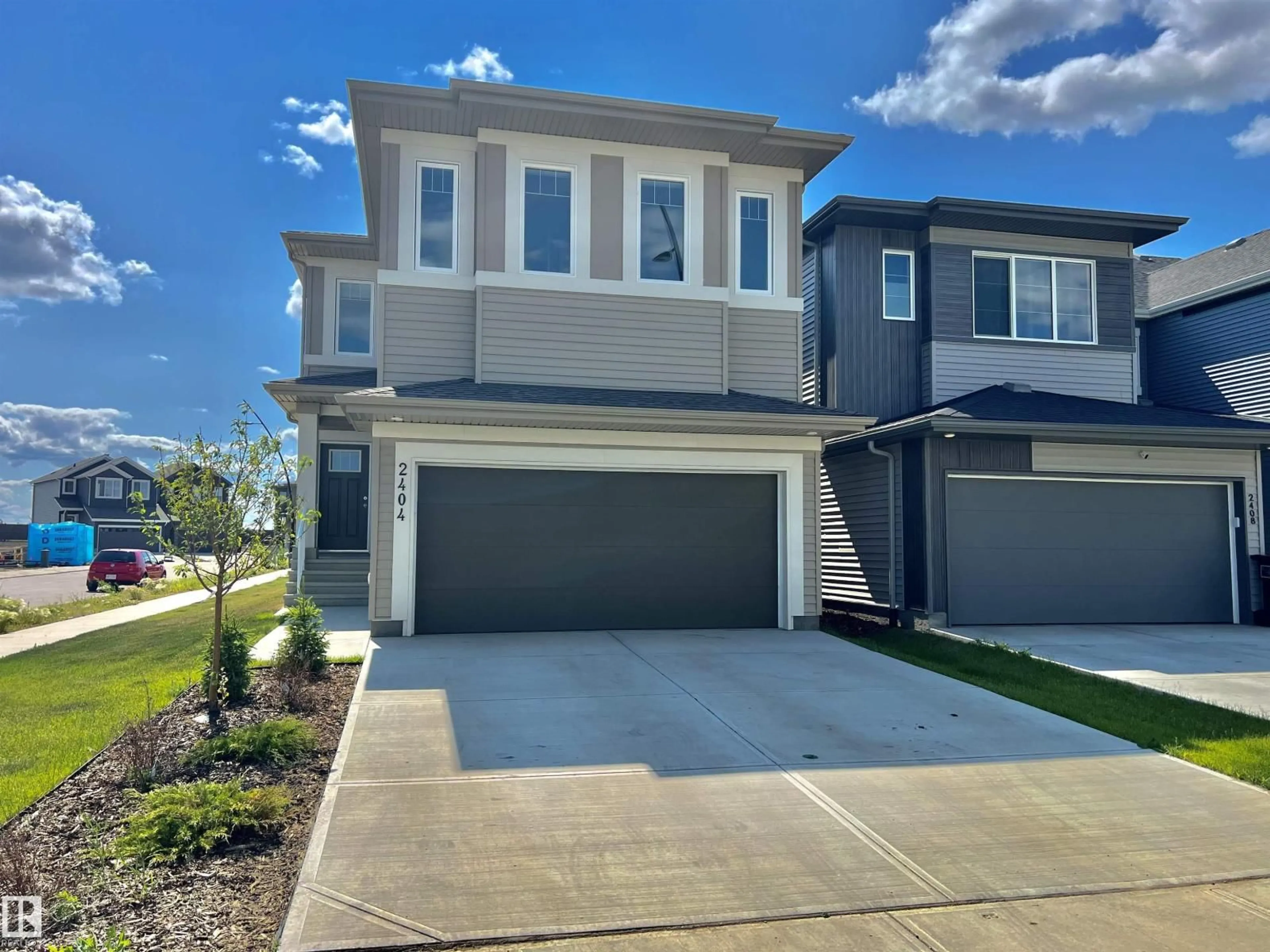 A pic from outside/outdoor area/front of a property/back of a property/a pic from drone, street for NW - 2404 193 ST, Edmonton Alberta T6M2N6