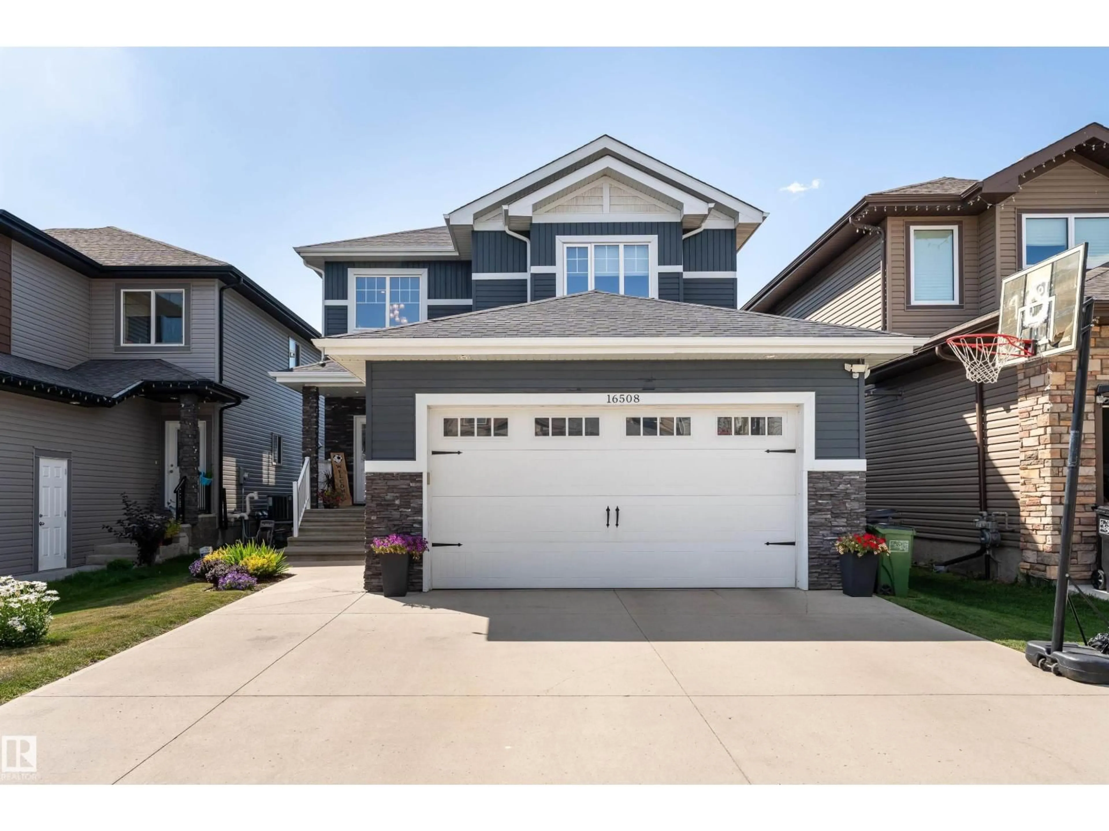 Home with vinyl exterior material, street for NW - 16508 133 ST, Edmonton Alberta T6V0J6