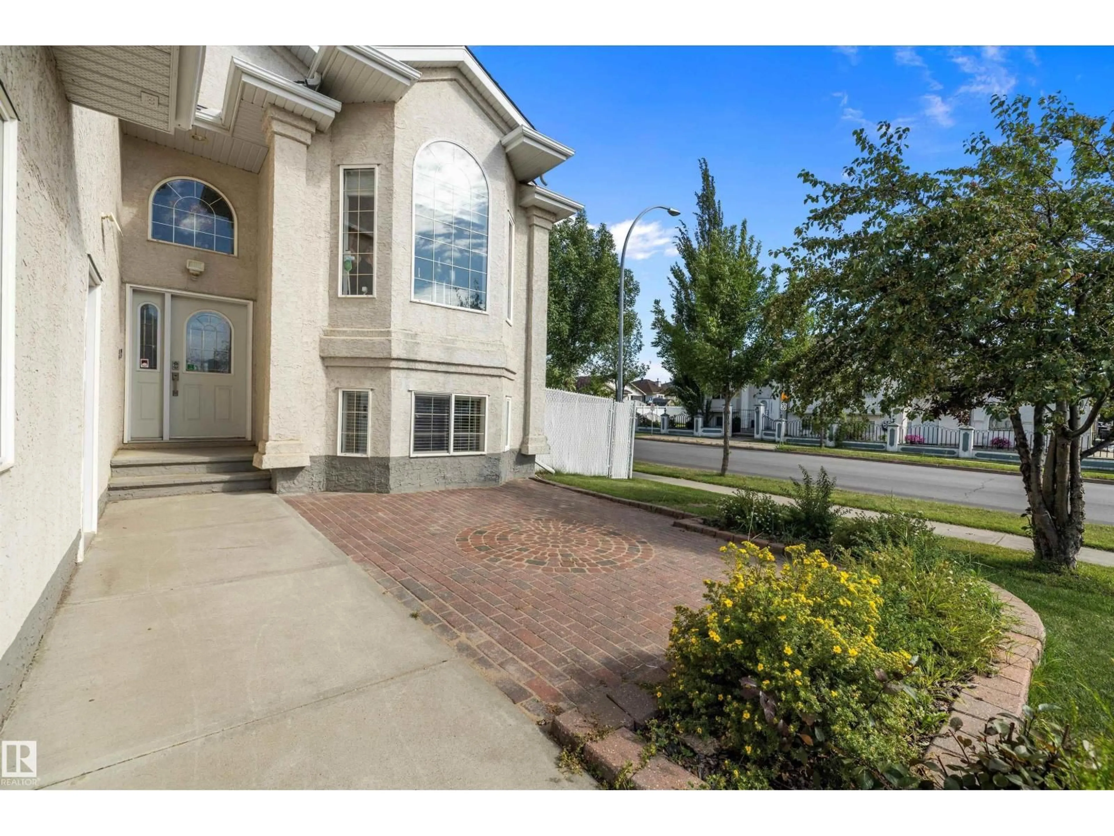Home with vinyl exterior material, street for NW - 16403 88 ST, Edmonton Alberta T5Z3W9
