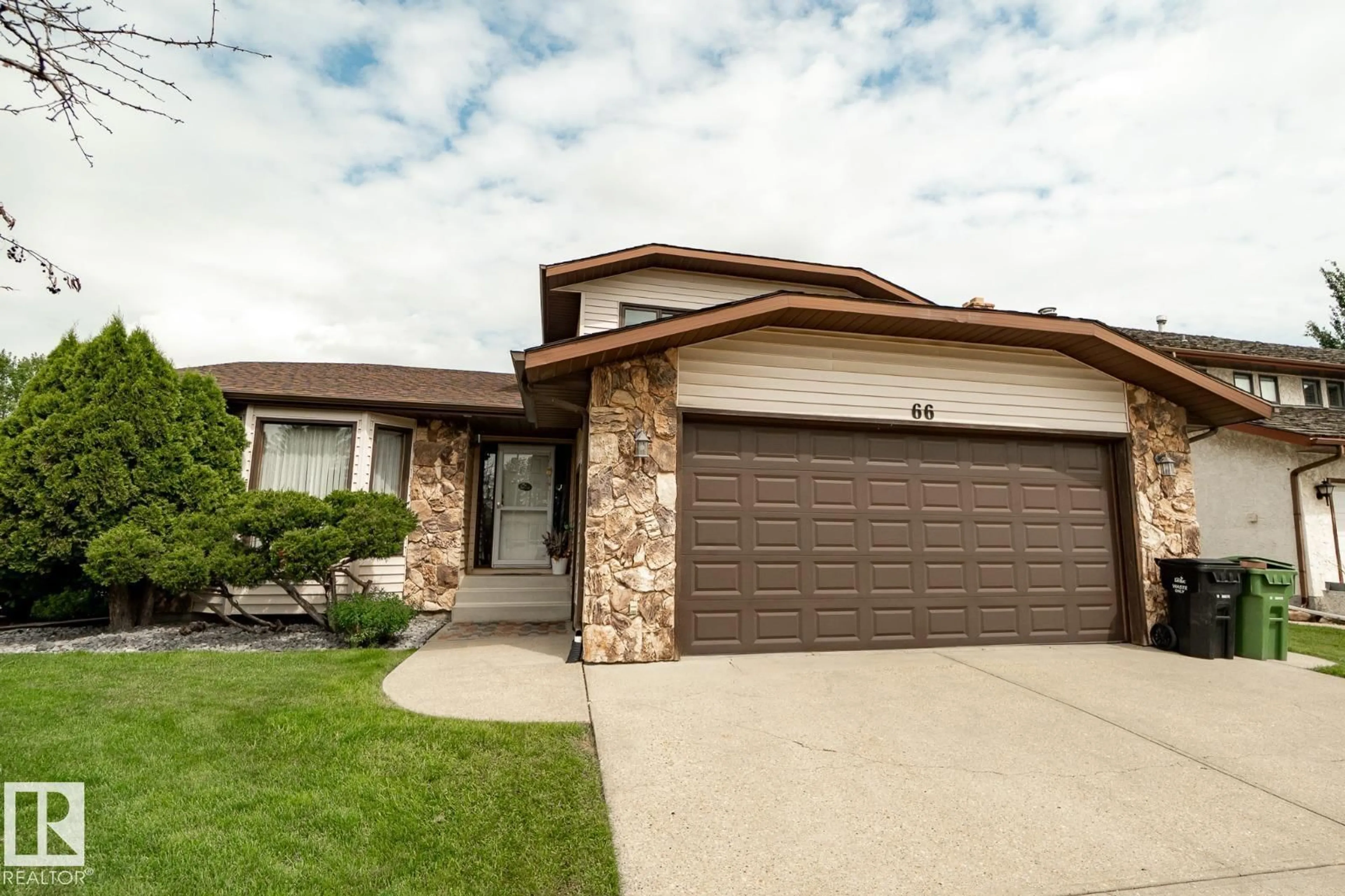 Home with vinyl exterior material, street for 66 ALEXANDER DR, Leduc Alberta T9E5G4