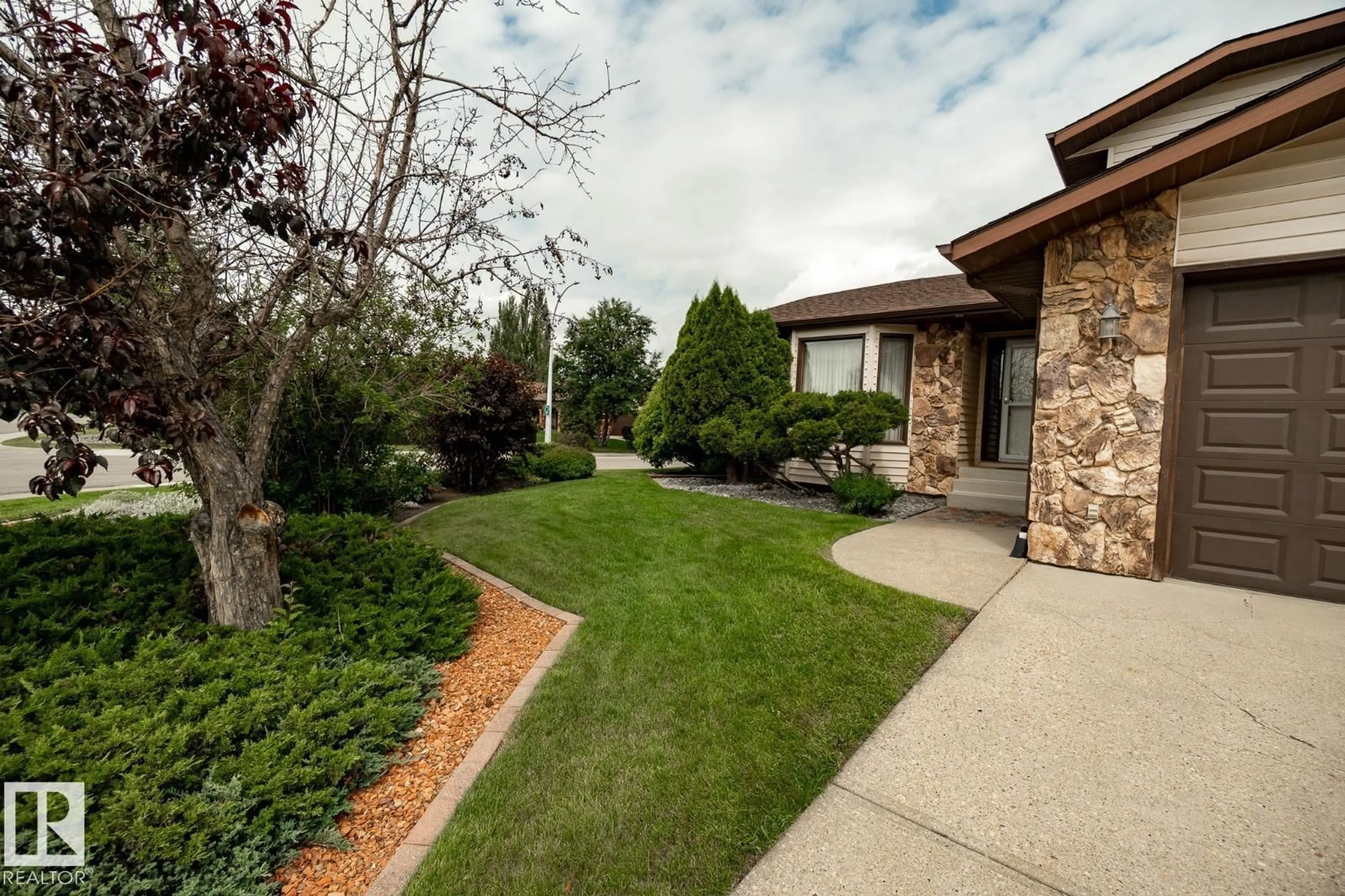 Home with brick exterior material, street for 66 ALEXANDER DR, Leduc Alberta T9E5G4