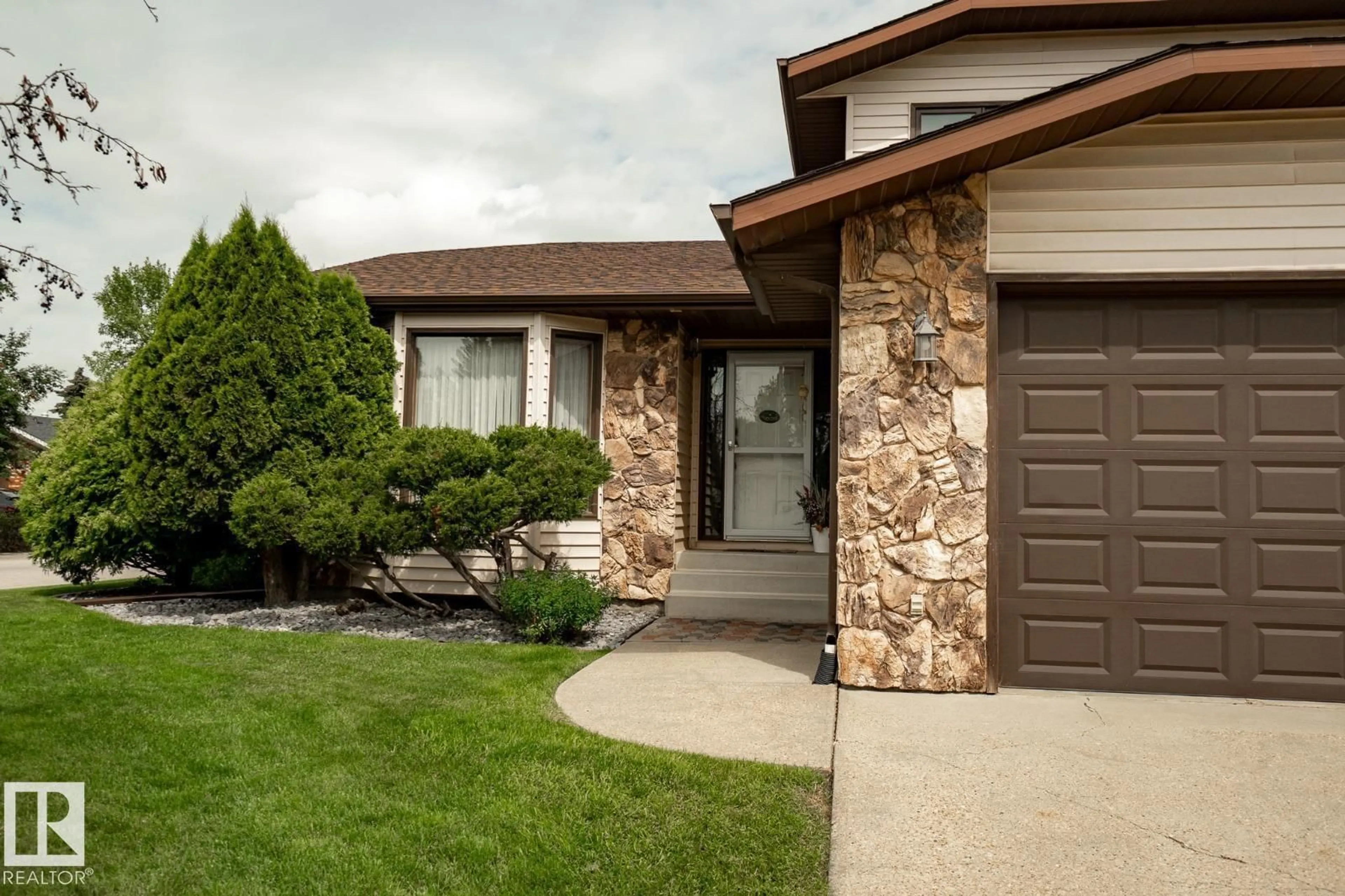 Home with vinyl exterior material, street for 66 ALEXANDER DR, Leduc Alberta T9E5G4