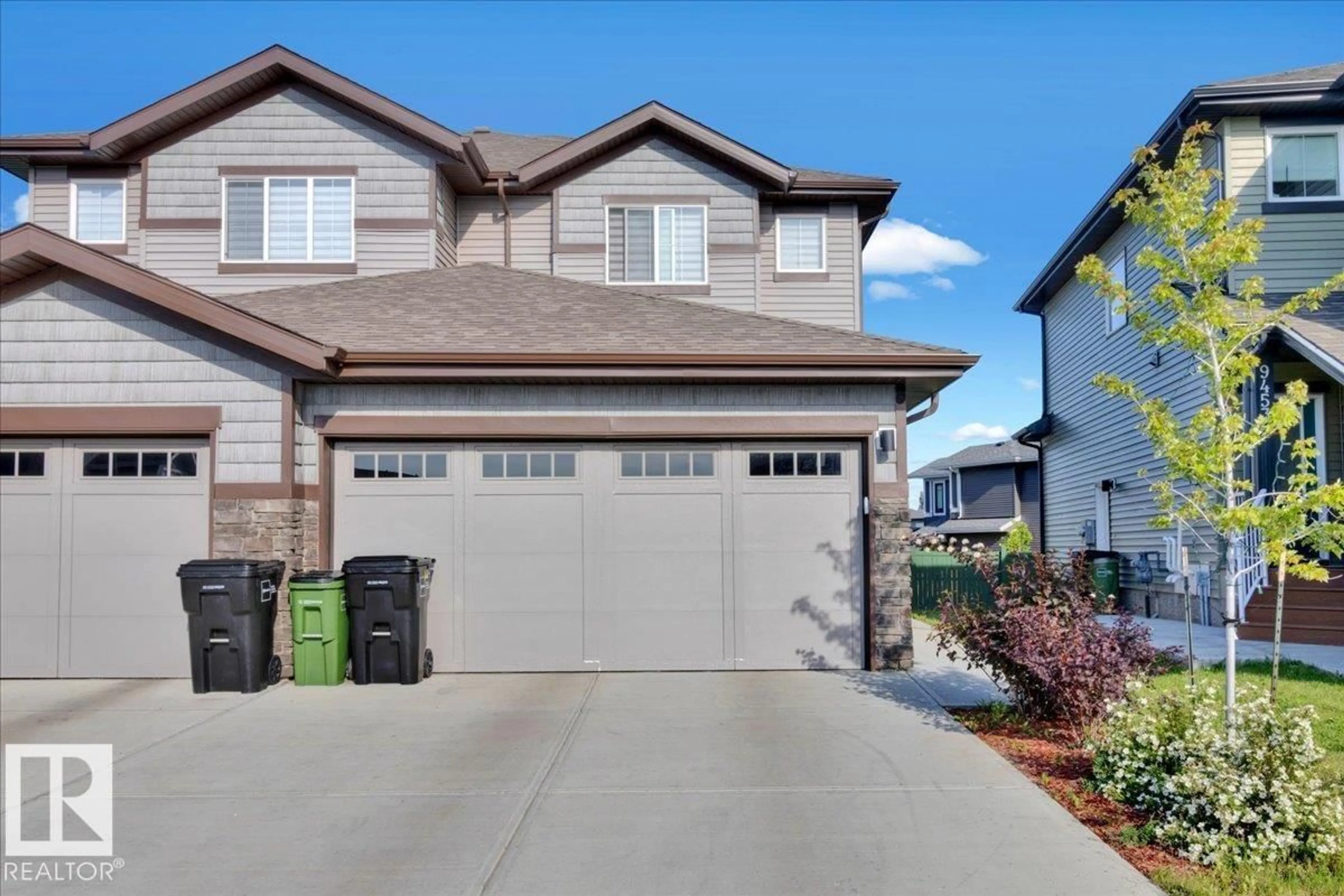 Home with vinyl exterior material, street for NW - 9457 206A ST, Edmonton Alberta T5T7M9